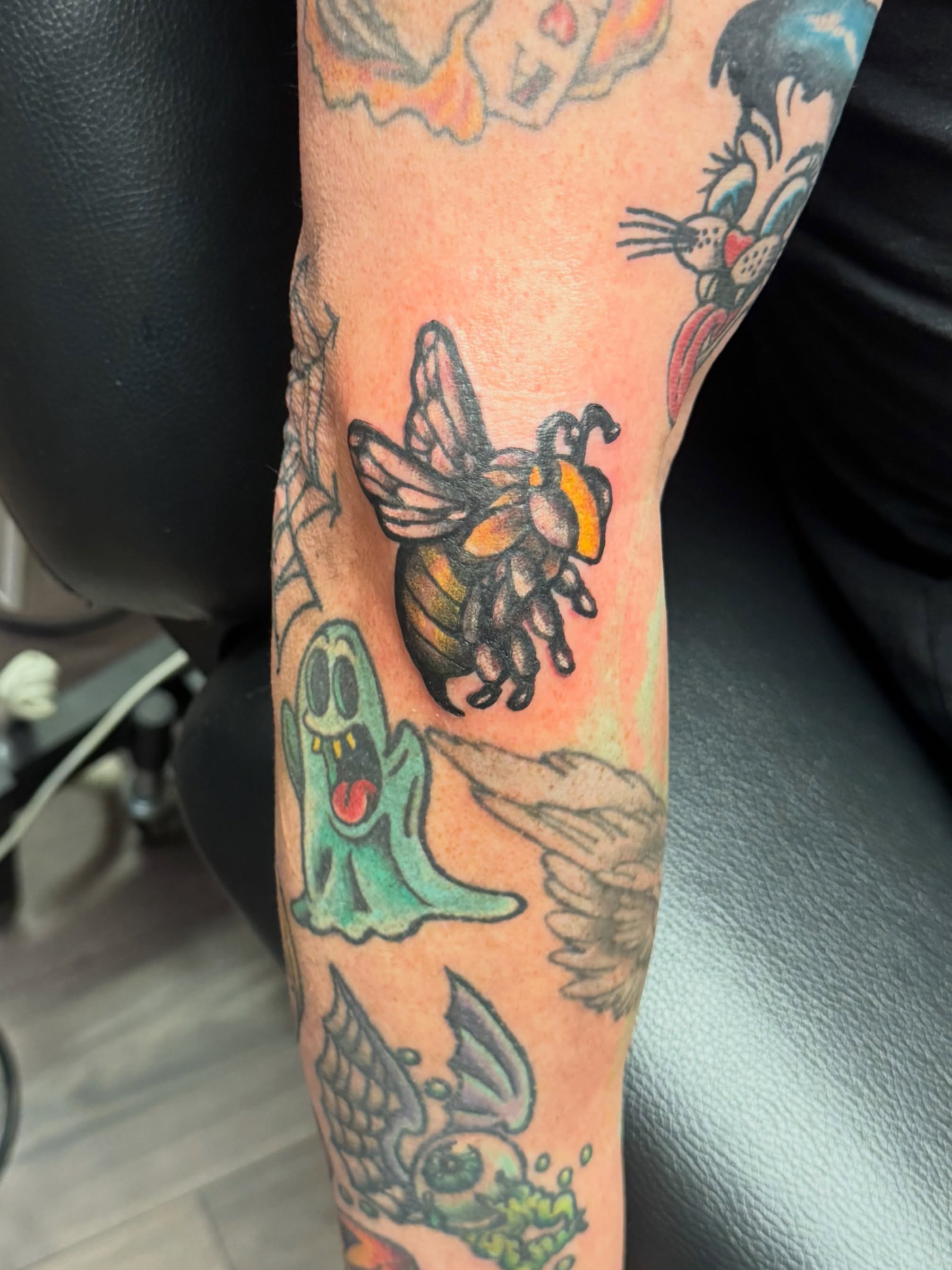 Bee American traditional tattoo on the forearm by Bob Howdy