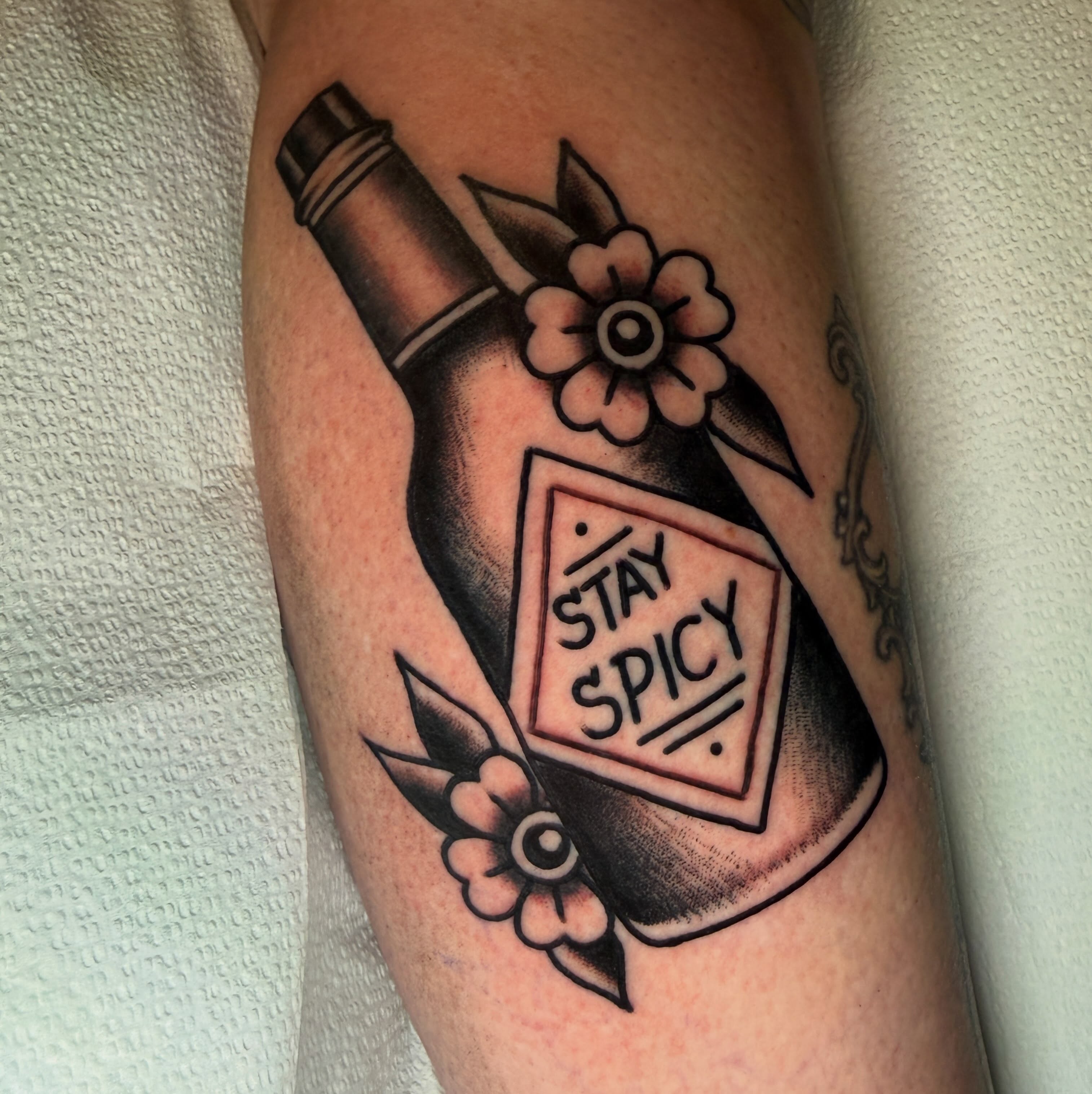 Spice bottle American traditional tattoo on the forearm by Ryan Moraski, Colorado Springs, Colorado