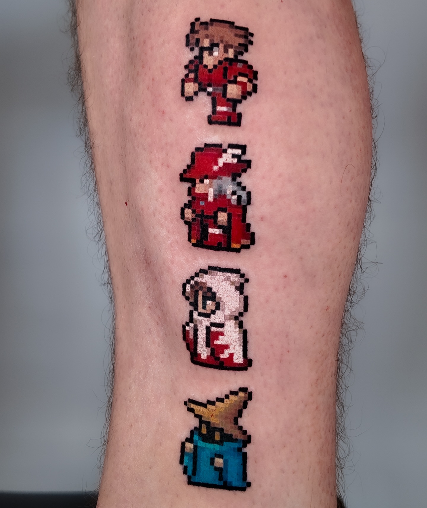 Pixel art characters dotwork tattoo on the forearm by m r p i x e l ๐ธ๐ฌ