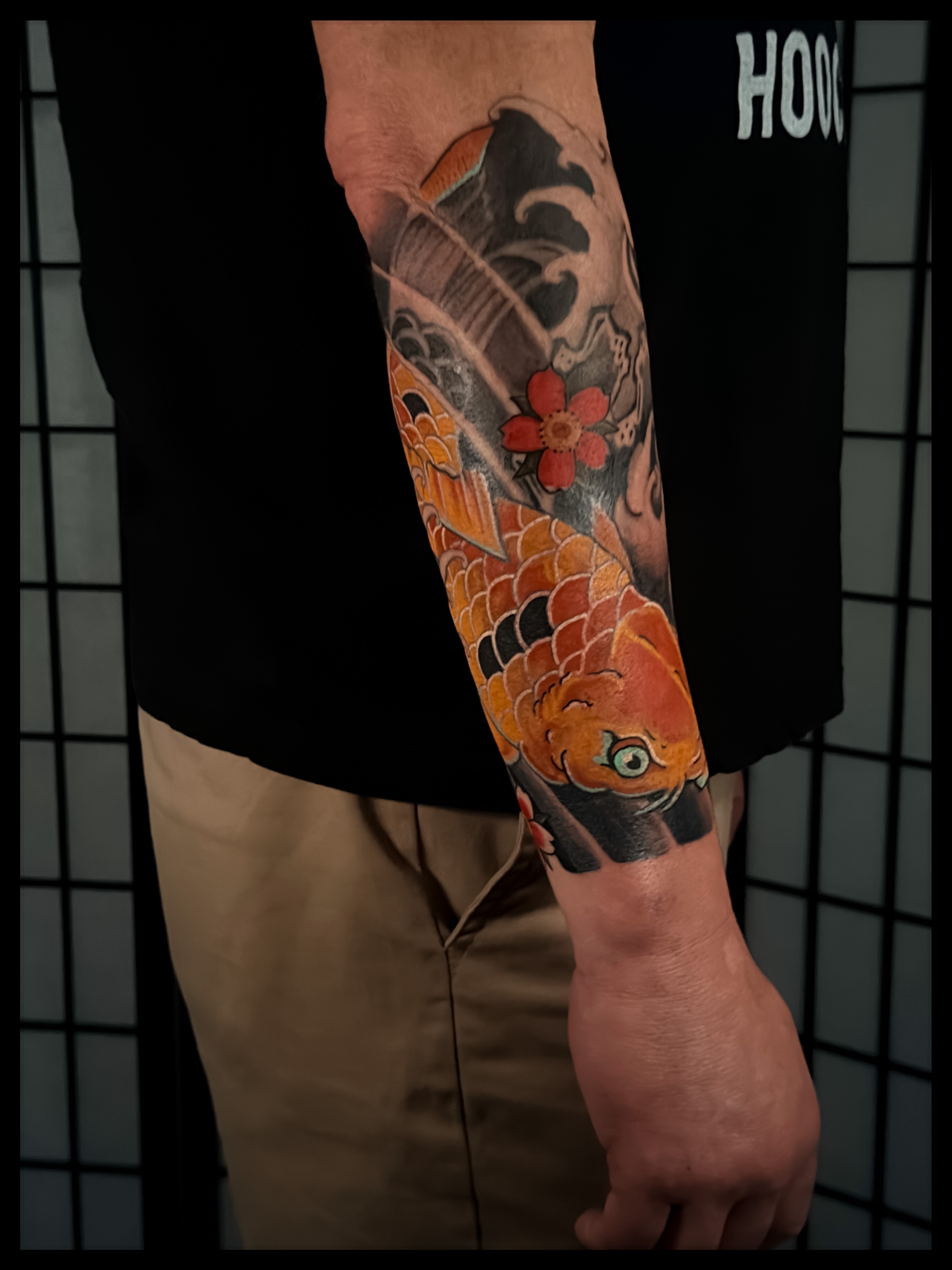 Koi fish japanese irezumi tattoo on the forearm by Noah Morris