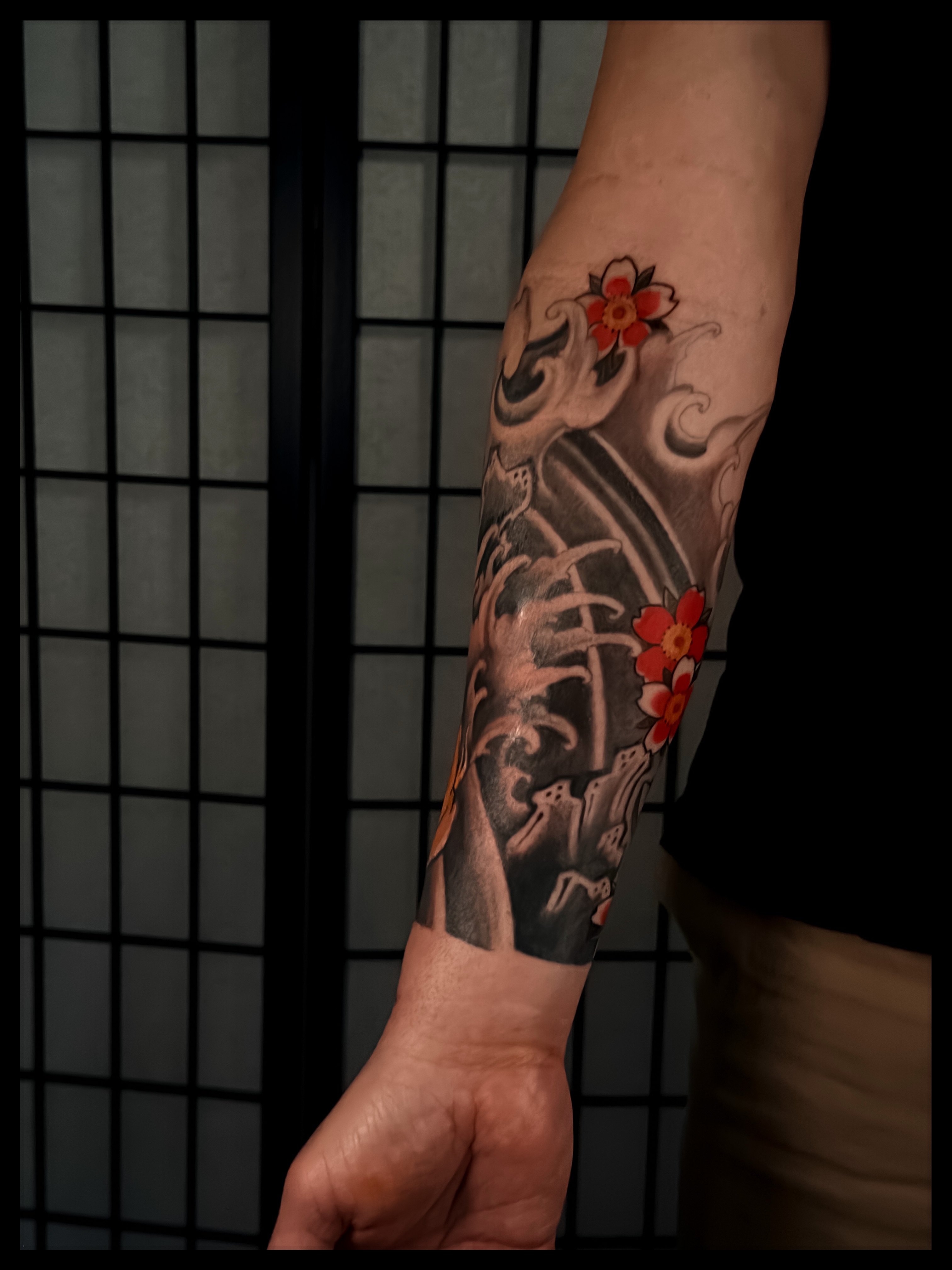 Cherry blossoms and kanji japanese irezumi tattoo on the forearm by Noah Morris