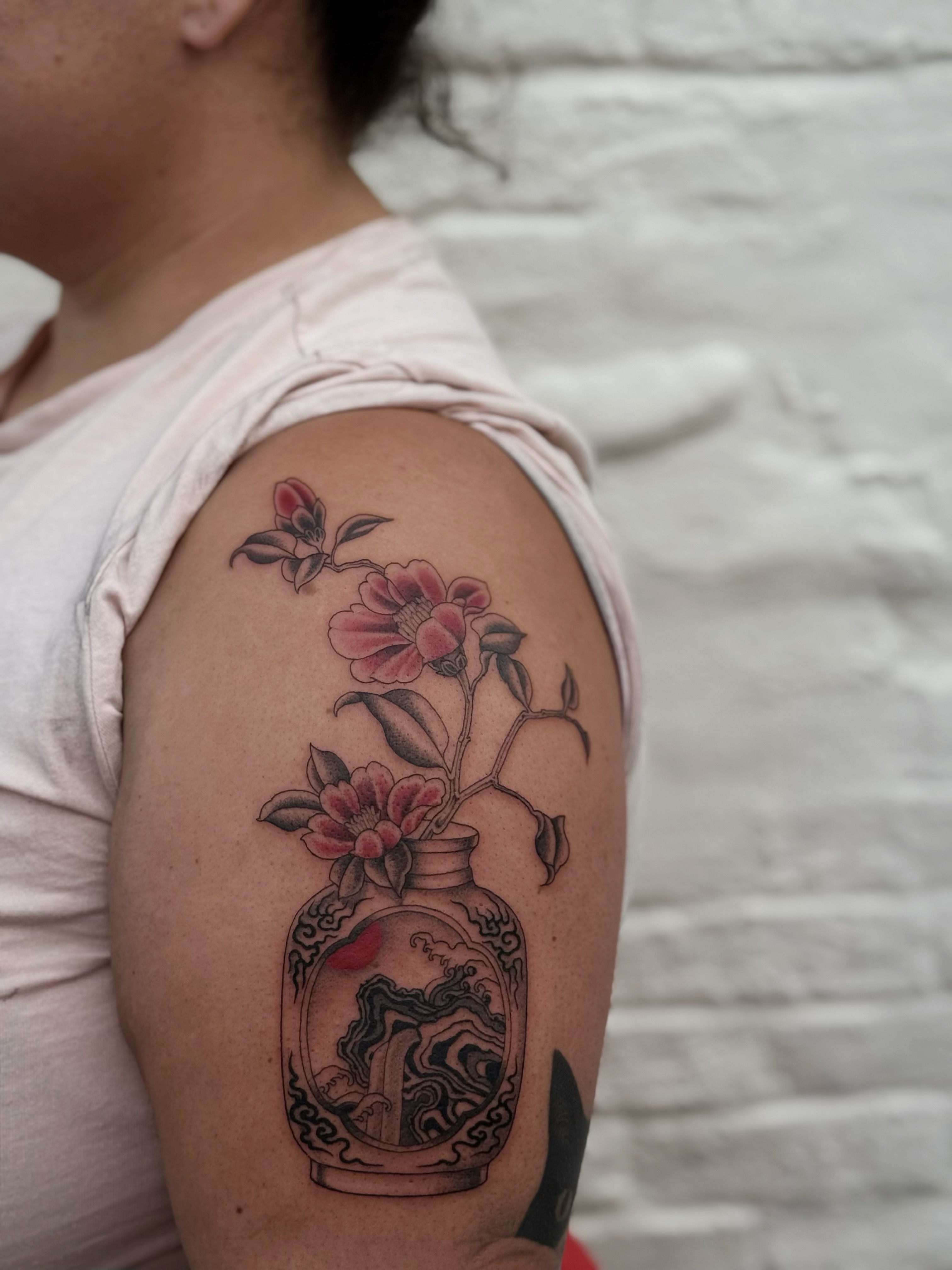 Flower vase black and grey tattoo on the shoulder by Virginia 🥀Neo Traditional