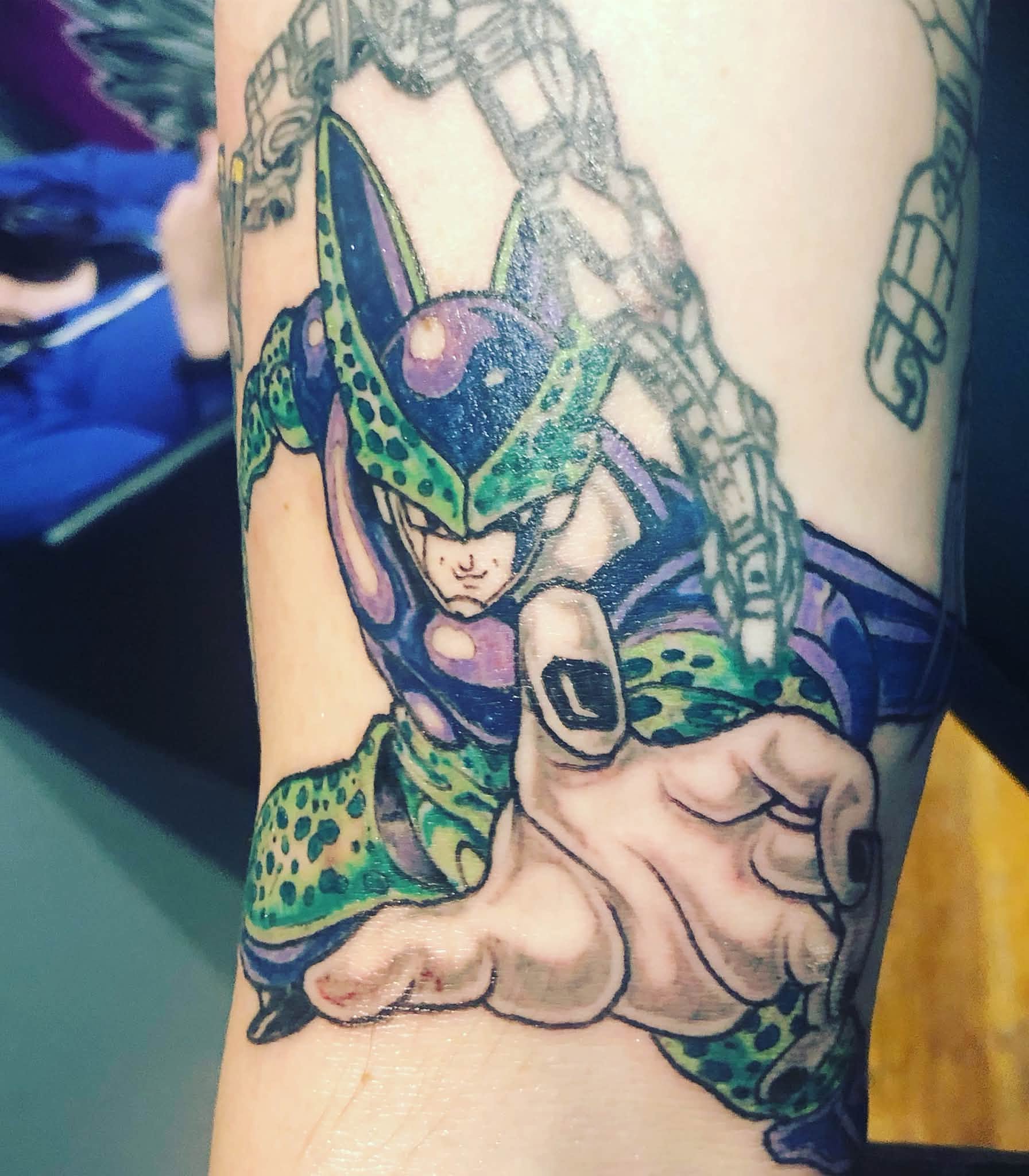 Cell from Dragon Ball Z anime tattoo on the forearm by Josh O’ + Bird ☘️ 🪶