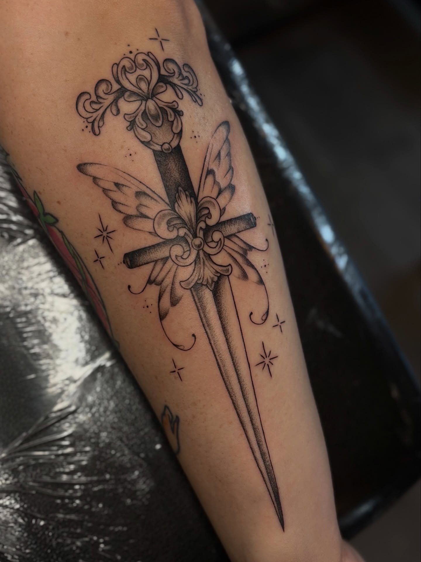 Sword with wings ornamental tattoo on the forearm by emery ♡ slc utah tattoo artist