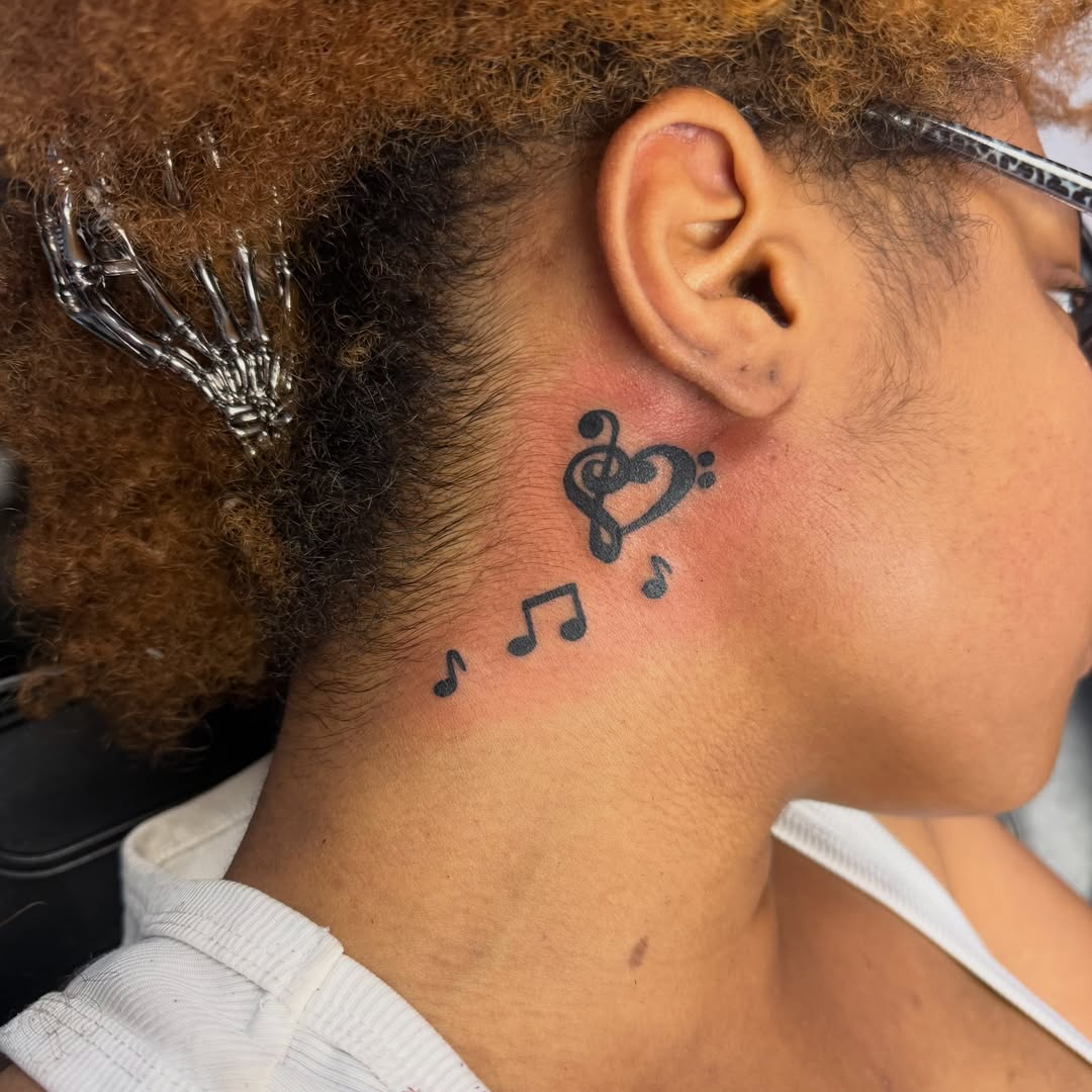 Music notes and heart black and grey tattoo on the neck by Shan 🤘 Tattoo Artist ⚡️ MN 🌲