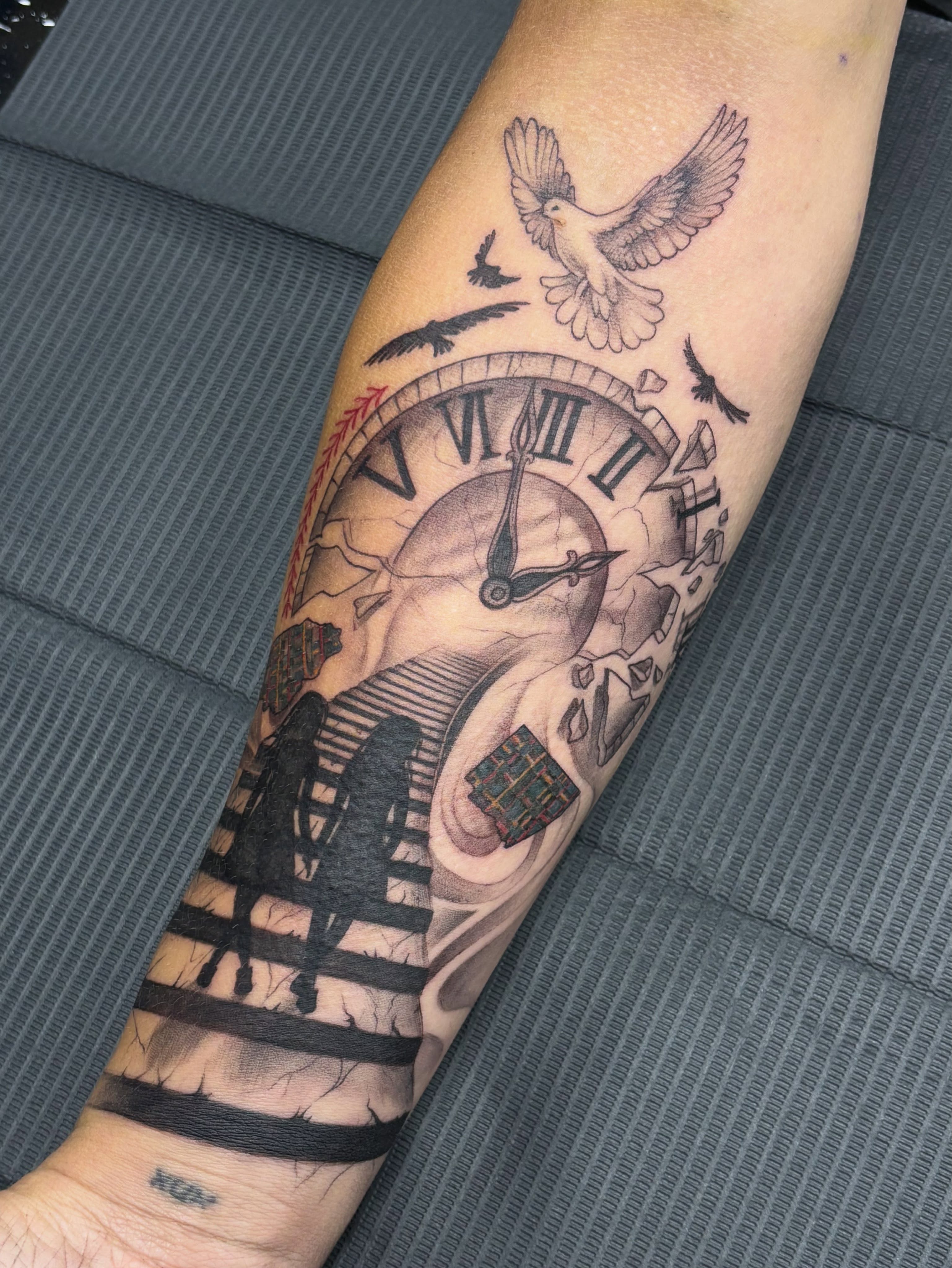 Clock and staircase realism tattoo on the forearm by Jennifer Flores