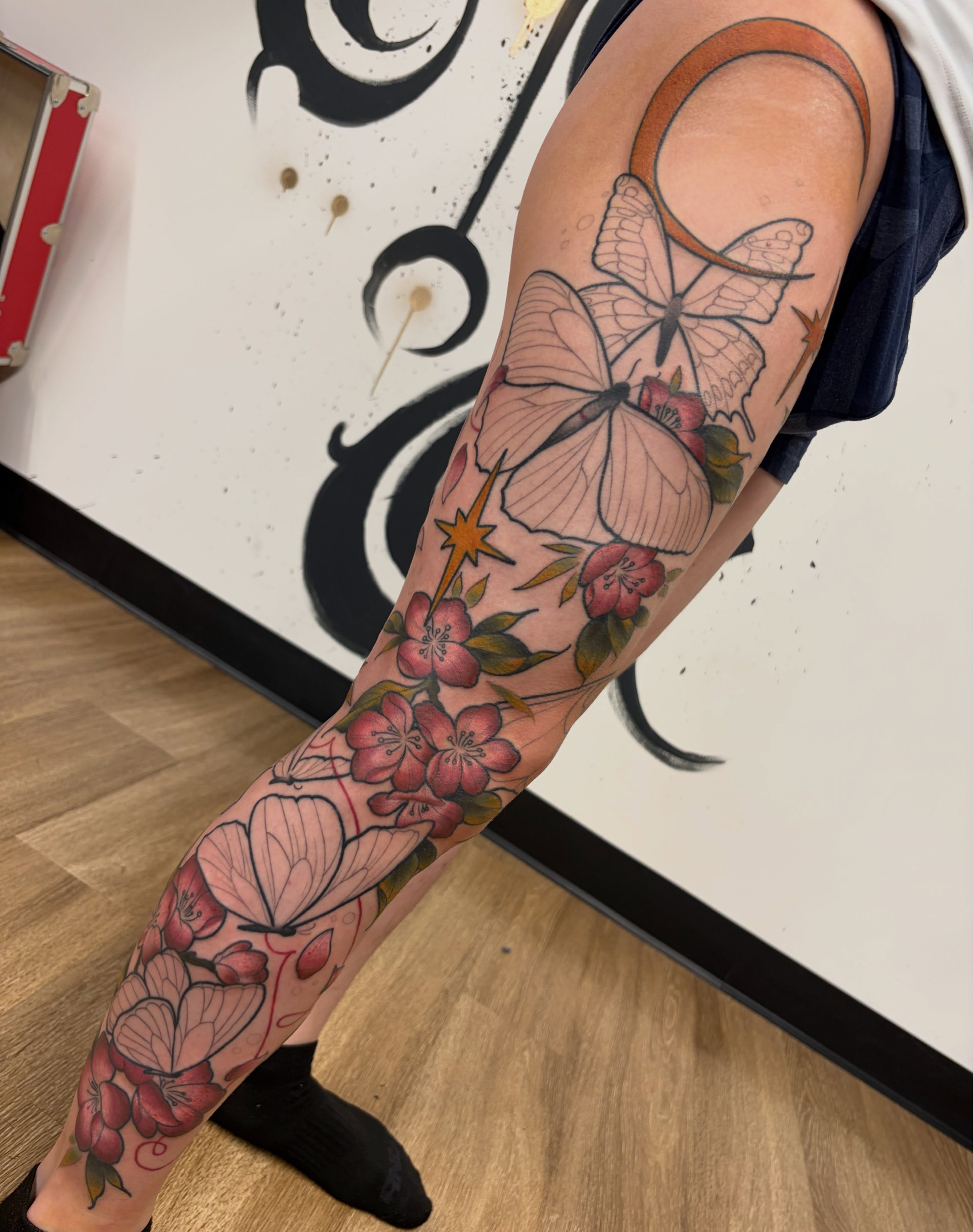 Butterflies and flowers new school tattoo on the forearm by Kayla Fay, Baton Rouge, Louisiana
