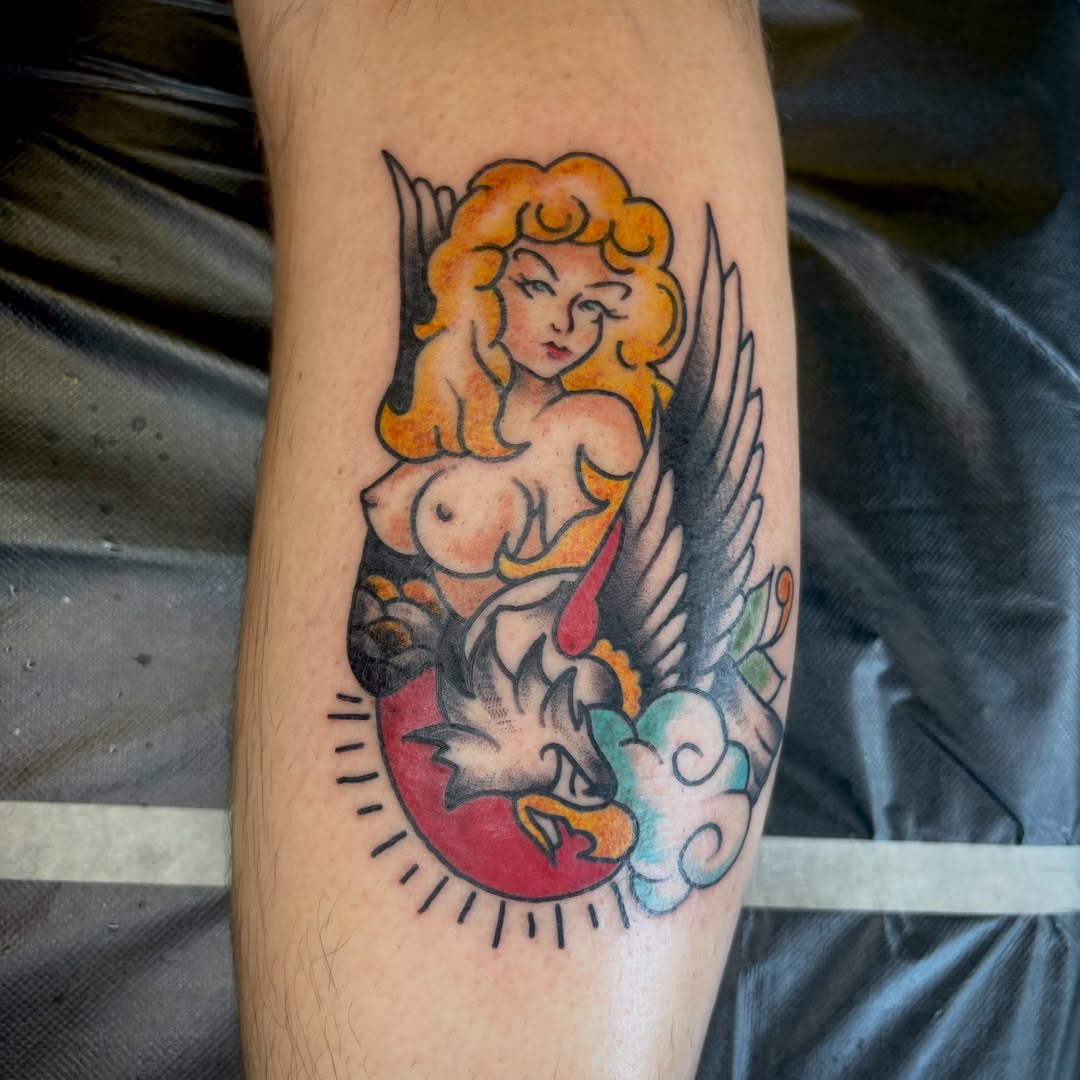 Angel with wings American traditional tattoo on the forearm by Lauren Deets