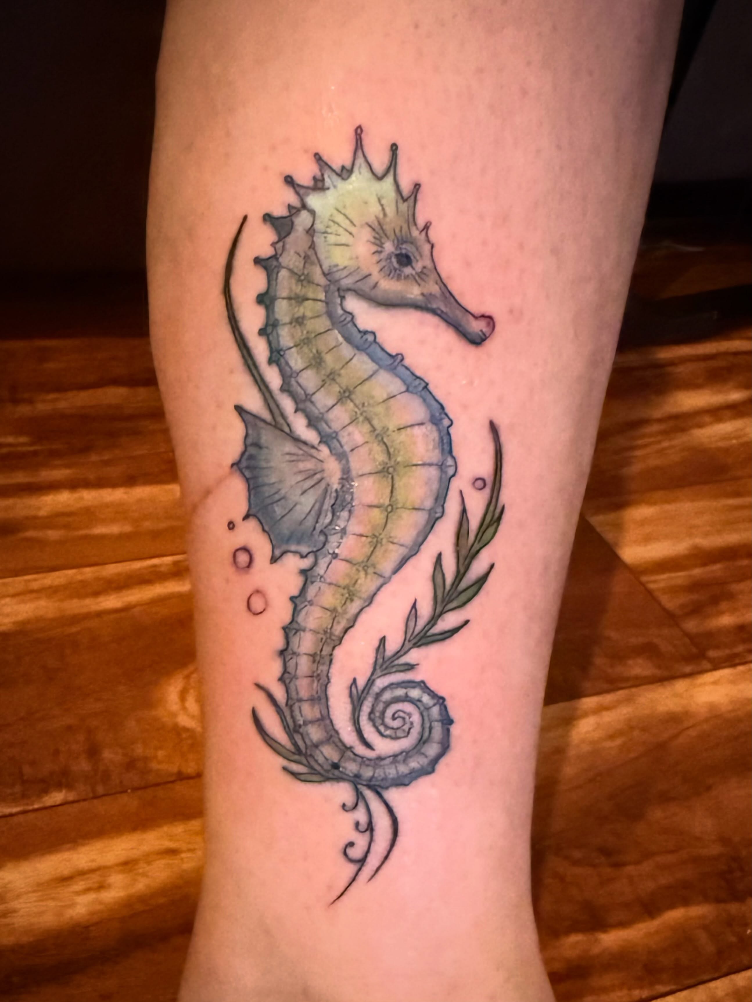 Seahorse realism tattoo on the forearm by Darby Antonucci