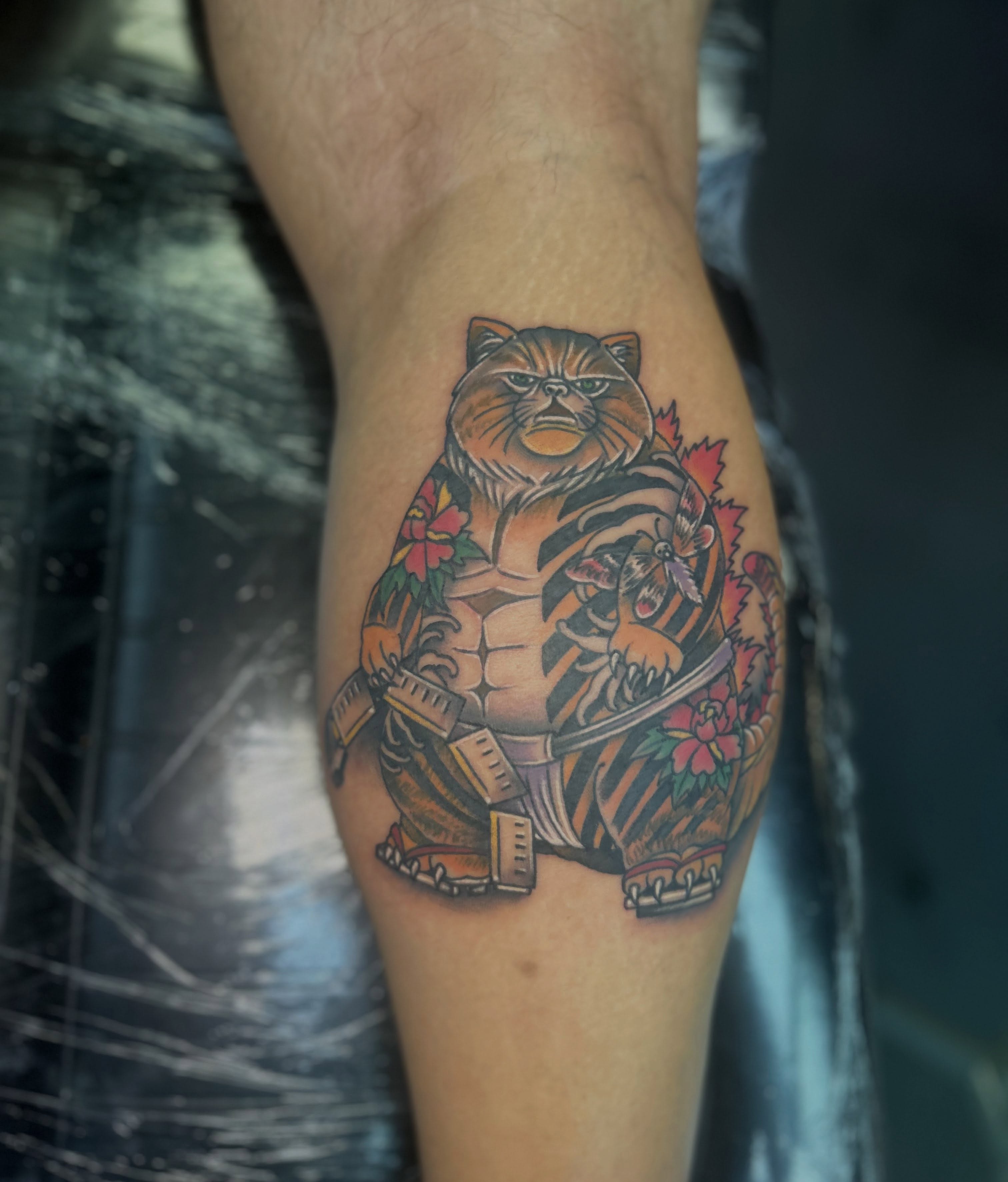Tiger American traditional tattoo on the thigh by Daemion