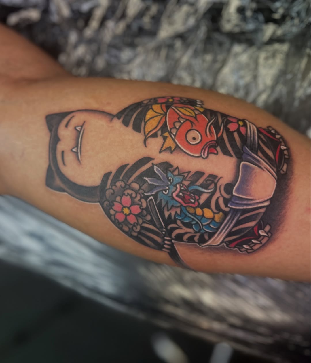 Japanese mask and dragon American traditional tattoo on the forearm by Daemion