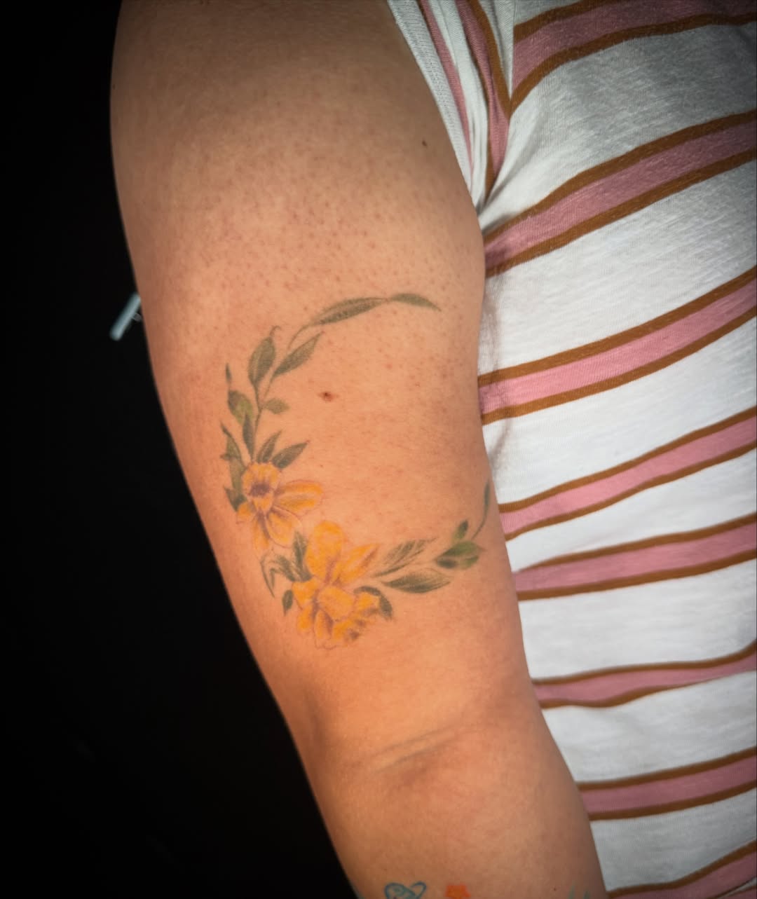 Yellow flowers new school tattoo on the forearm by Monica Gonzalez
