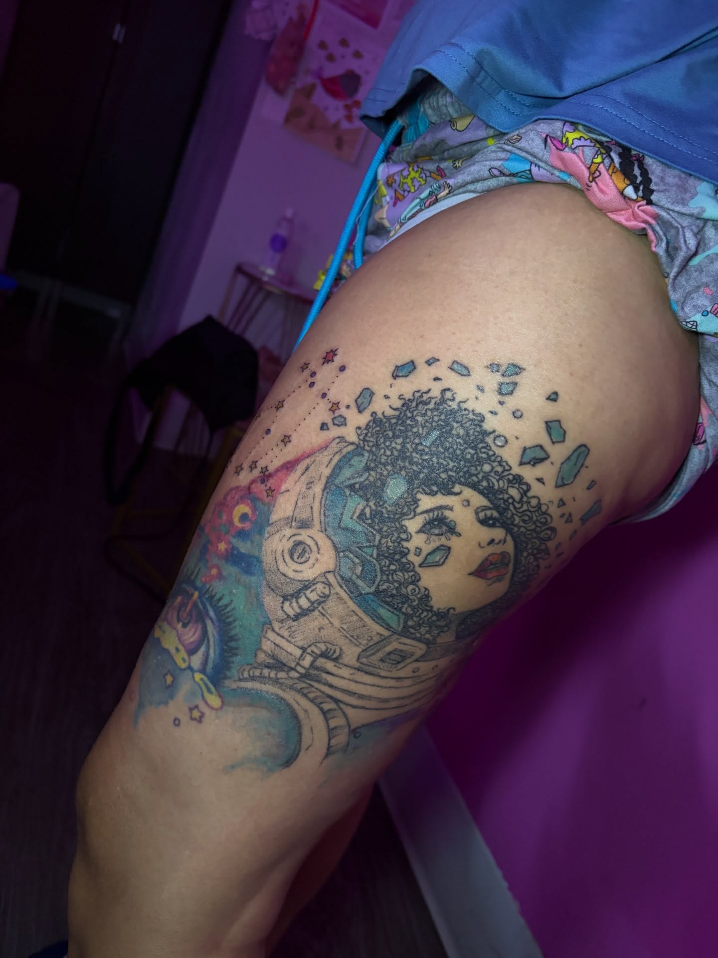 Astronaut with afro new school tattoo on the thigh by Vegas Tattoo Mommy ๐๐, Las Vegas, Nevada