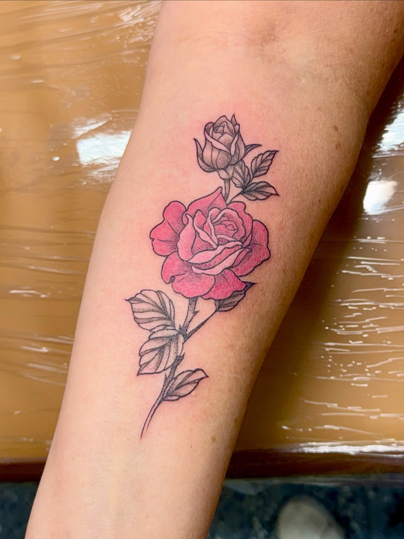 Rose black and grey tattoo on the forearm by Taylor Kay 🌿