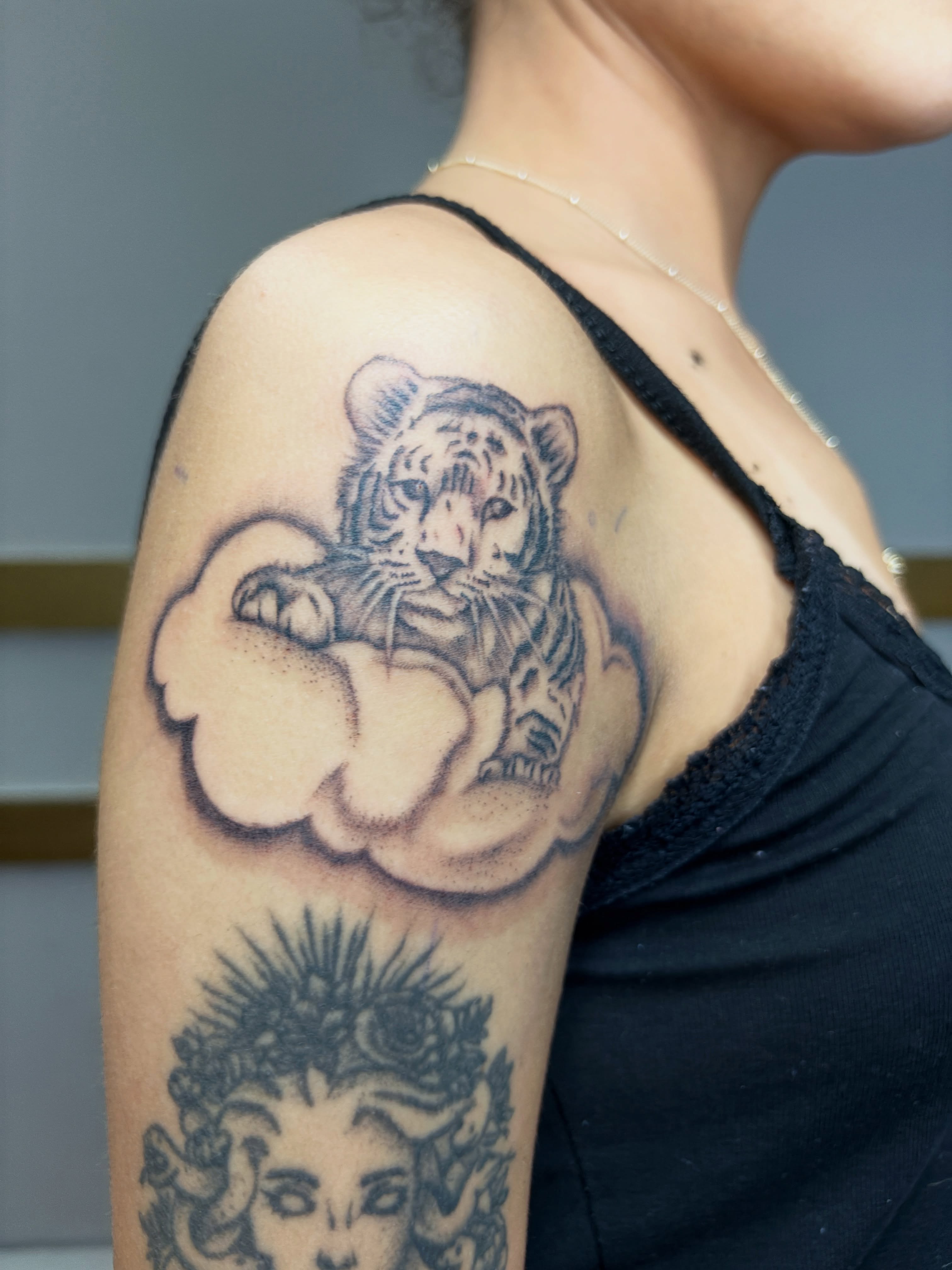 Tiger dotwork tattoo on the shoulder by Destineé