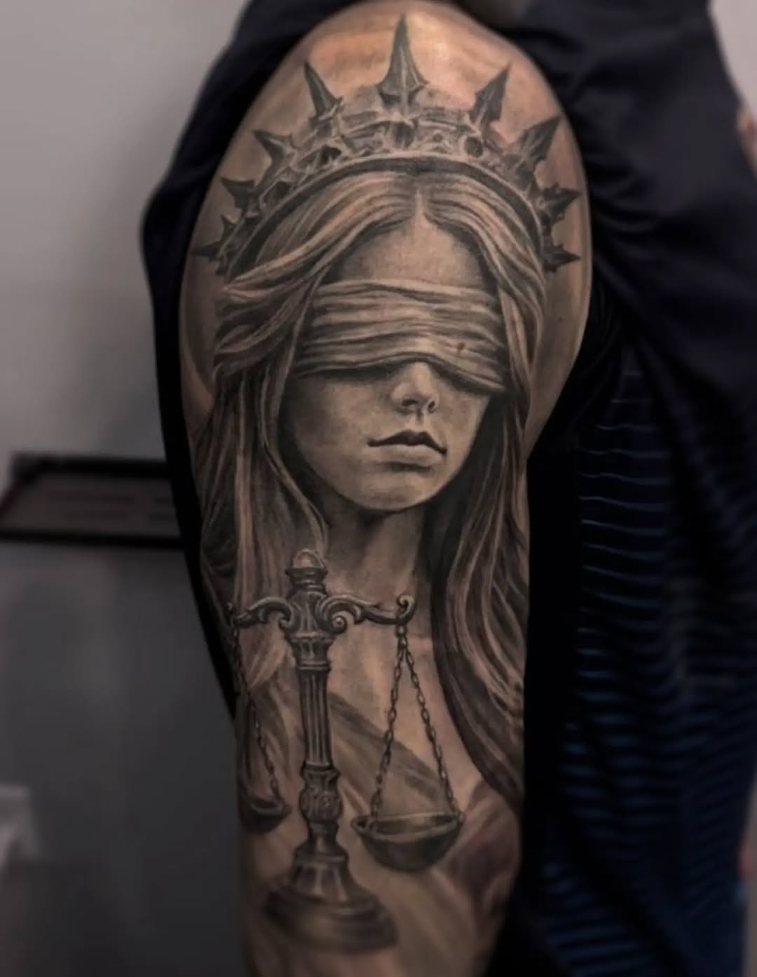 Tattoo by @tokarev_igor_tattoo — realism, black_and_grey