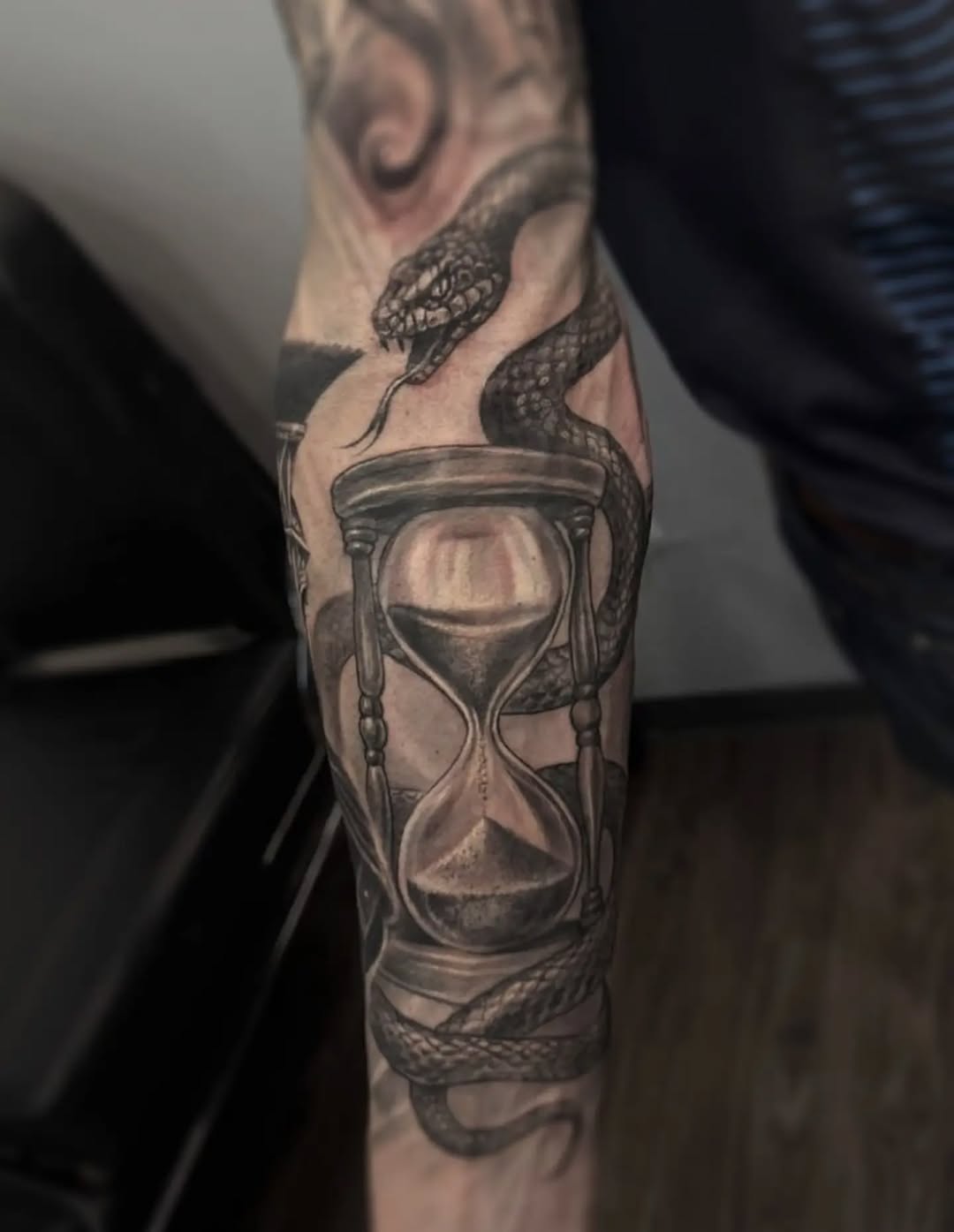 Tattoo by @tokarev_igor_tattoo — realism, black_and_grey