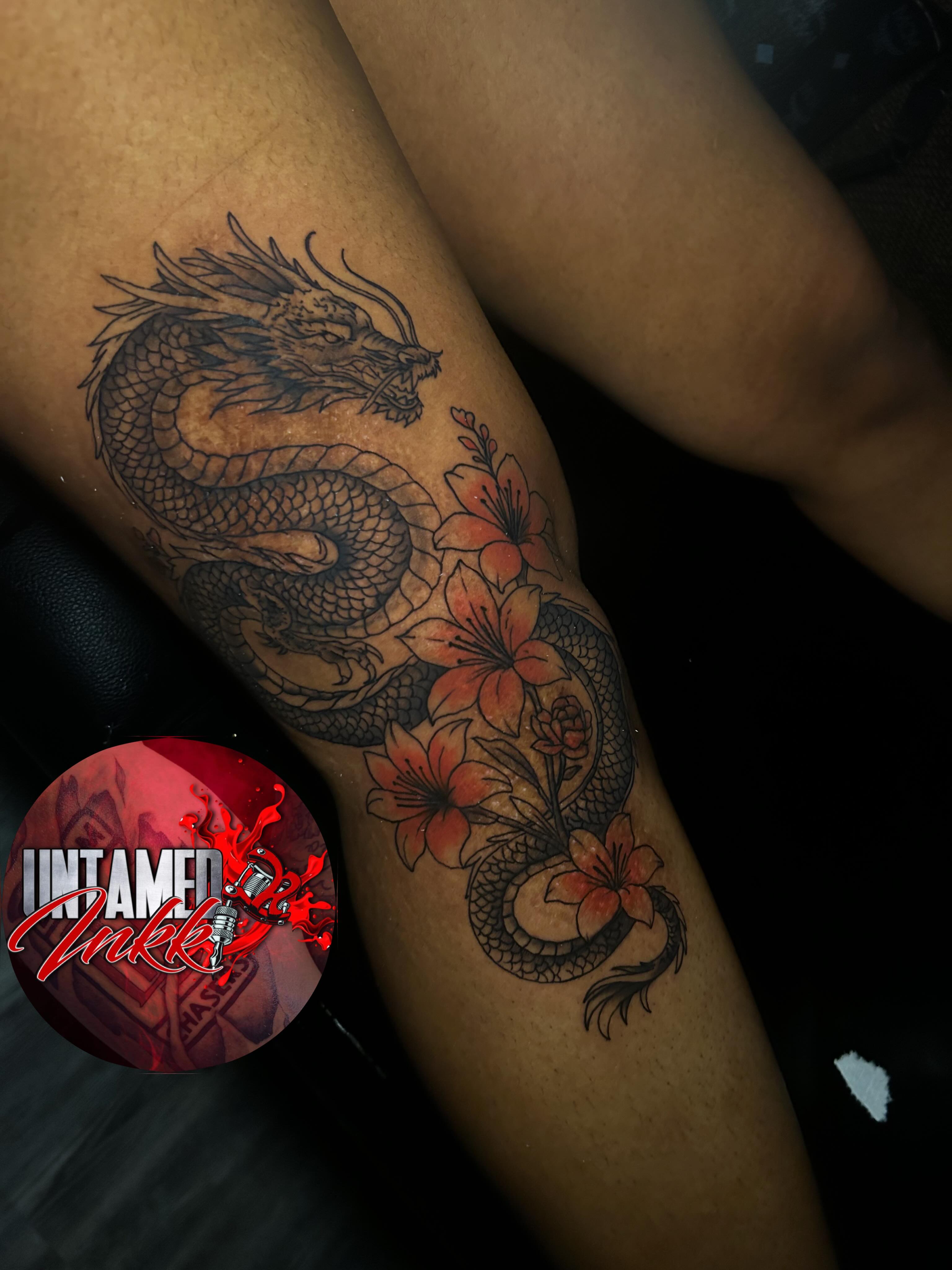 Dragon and flowers japanese irezumi tattoo on the thigh by Ferlandis Fitch, Long Beach, California