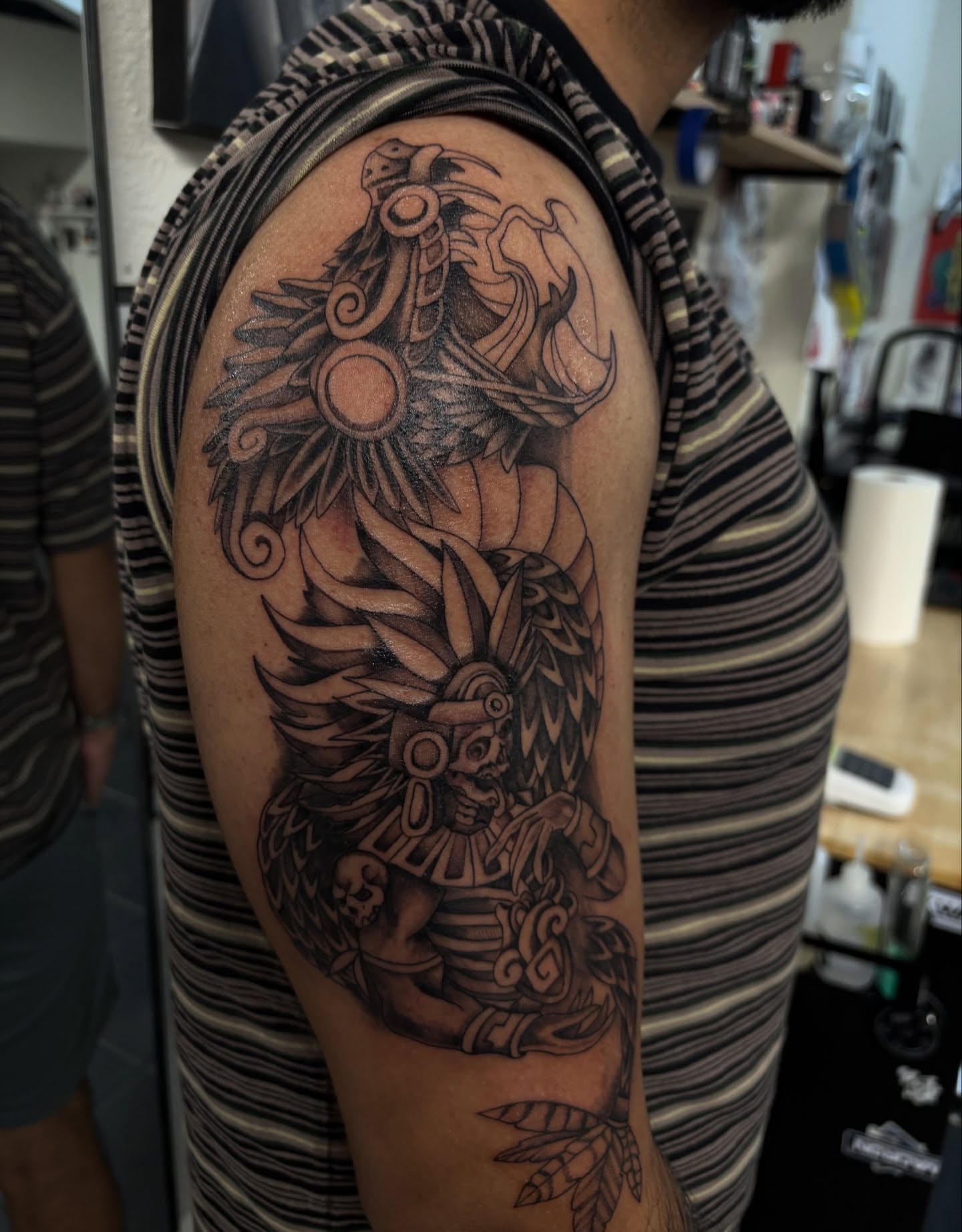 Mexican warrior black and grey tattoo on the shoulder by suzie