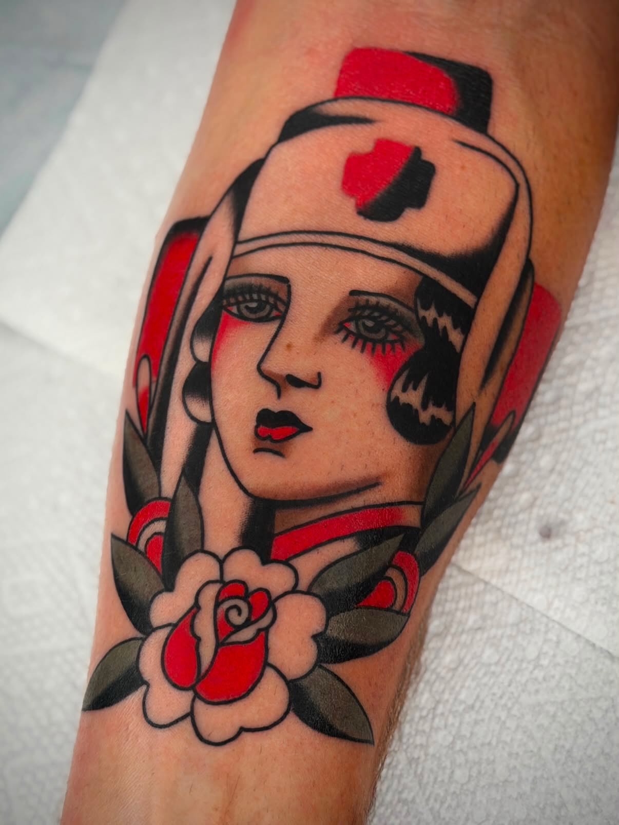 Nurse portrait American traditional tattoo on the forearm by Diego Treviño