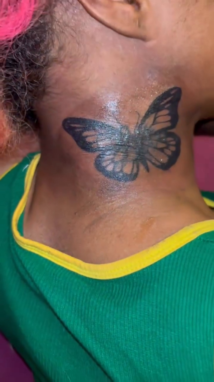 Butterfly fine line tattoo on the neck by @twosidedpretty