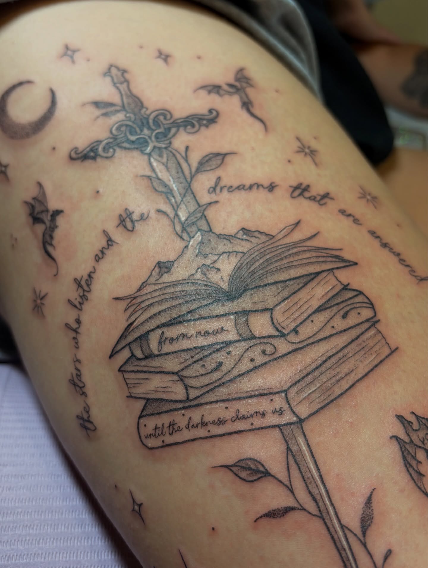 Book and sword realism tattoo on the thigh by Jen Osborne ♡ Cincinnati Tattoo Artist
