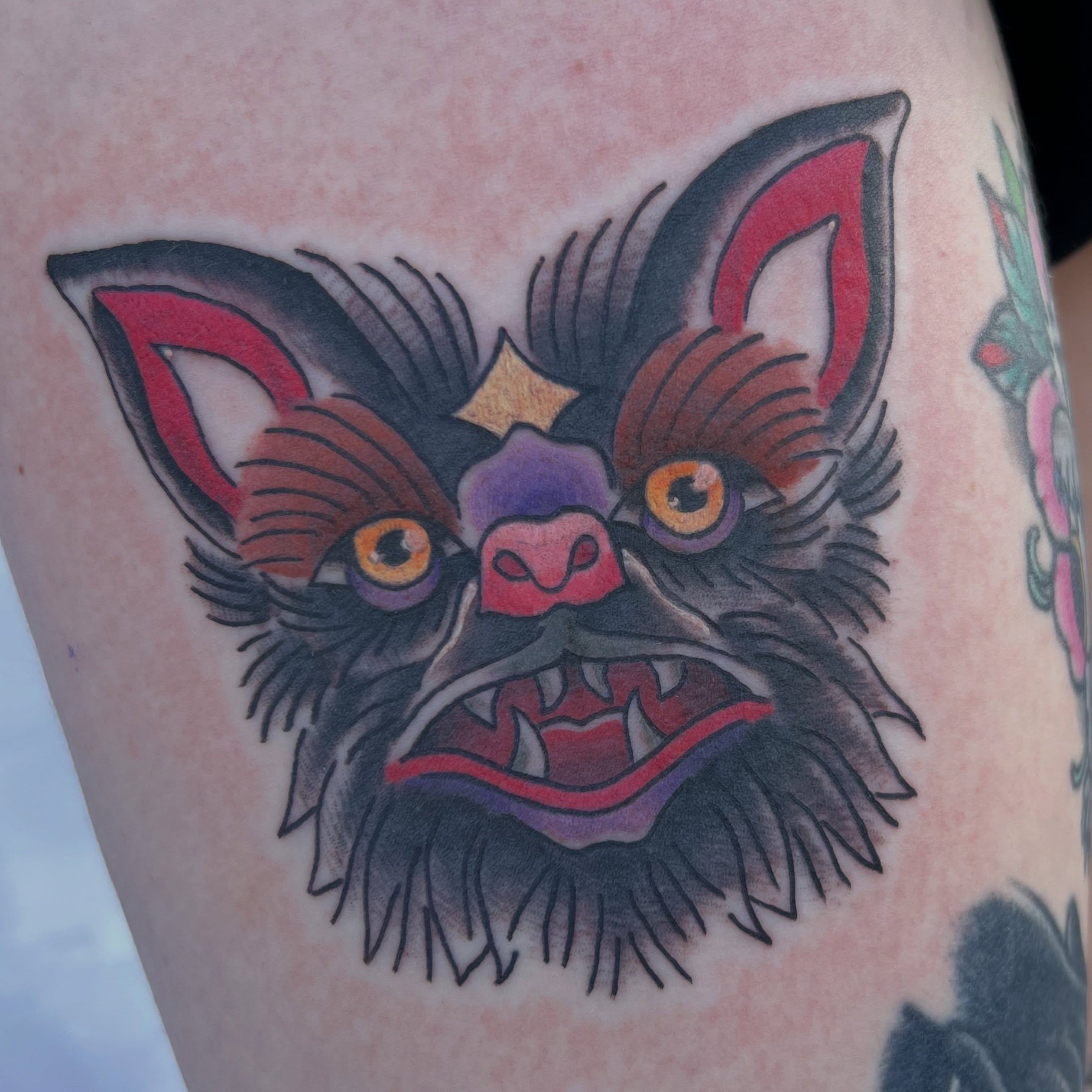 Bat American traditional tattoo on the thigh by Christopher Anderson-arnesen