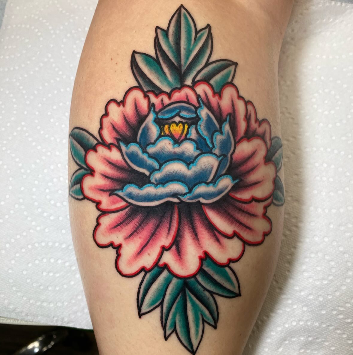 Peony American traditional tattoo on the thigh by Brandon Heredia, Vacaville, California