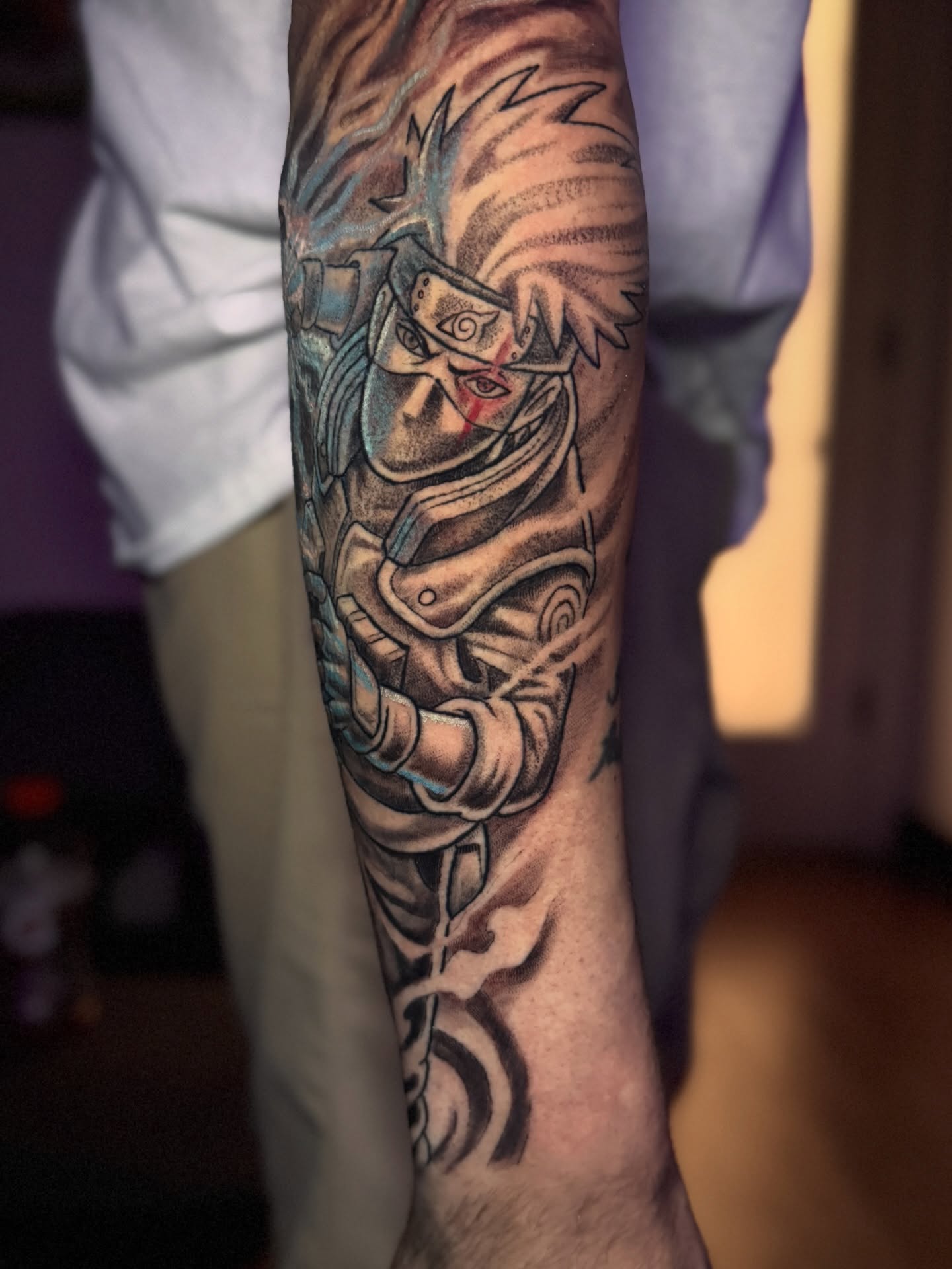 Naruto character anime tattoo on the forearm by Jarrod Gatzke