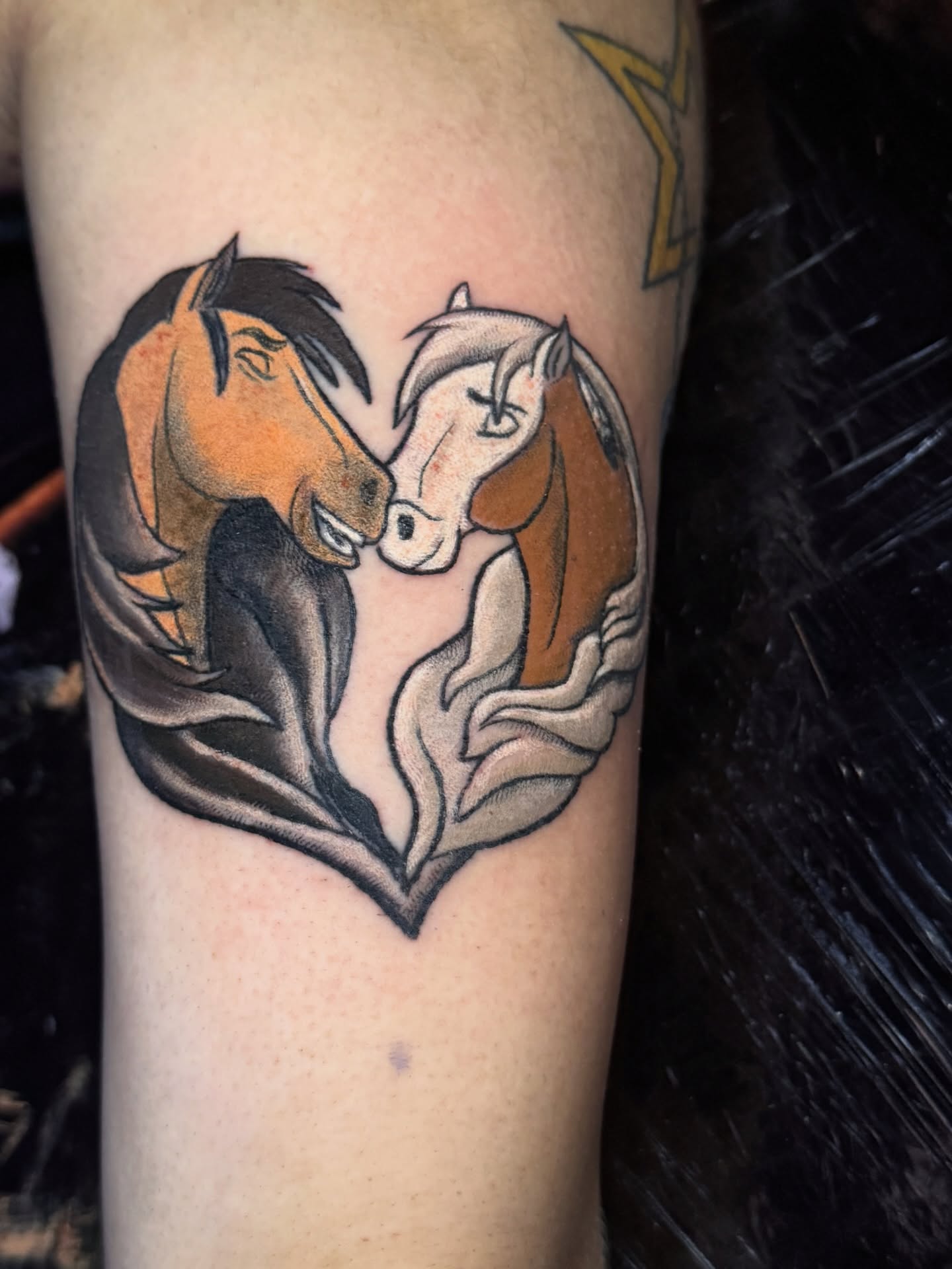 Horses realism tattoo on the forearm by Jarrod Gatzke