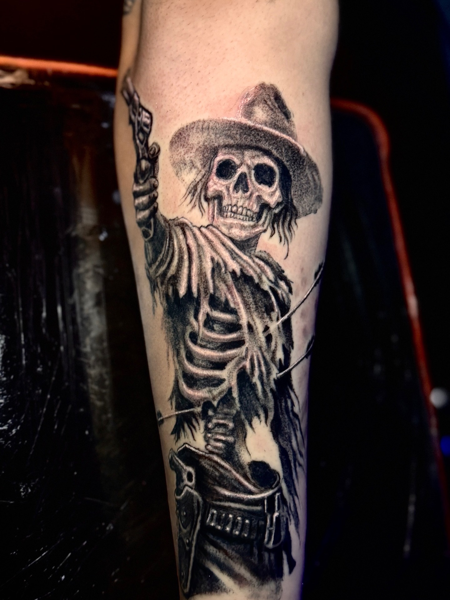 Cowboy skeleton realism tattoo on the forearm by Jarrod Gatzke