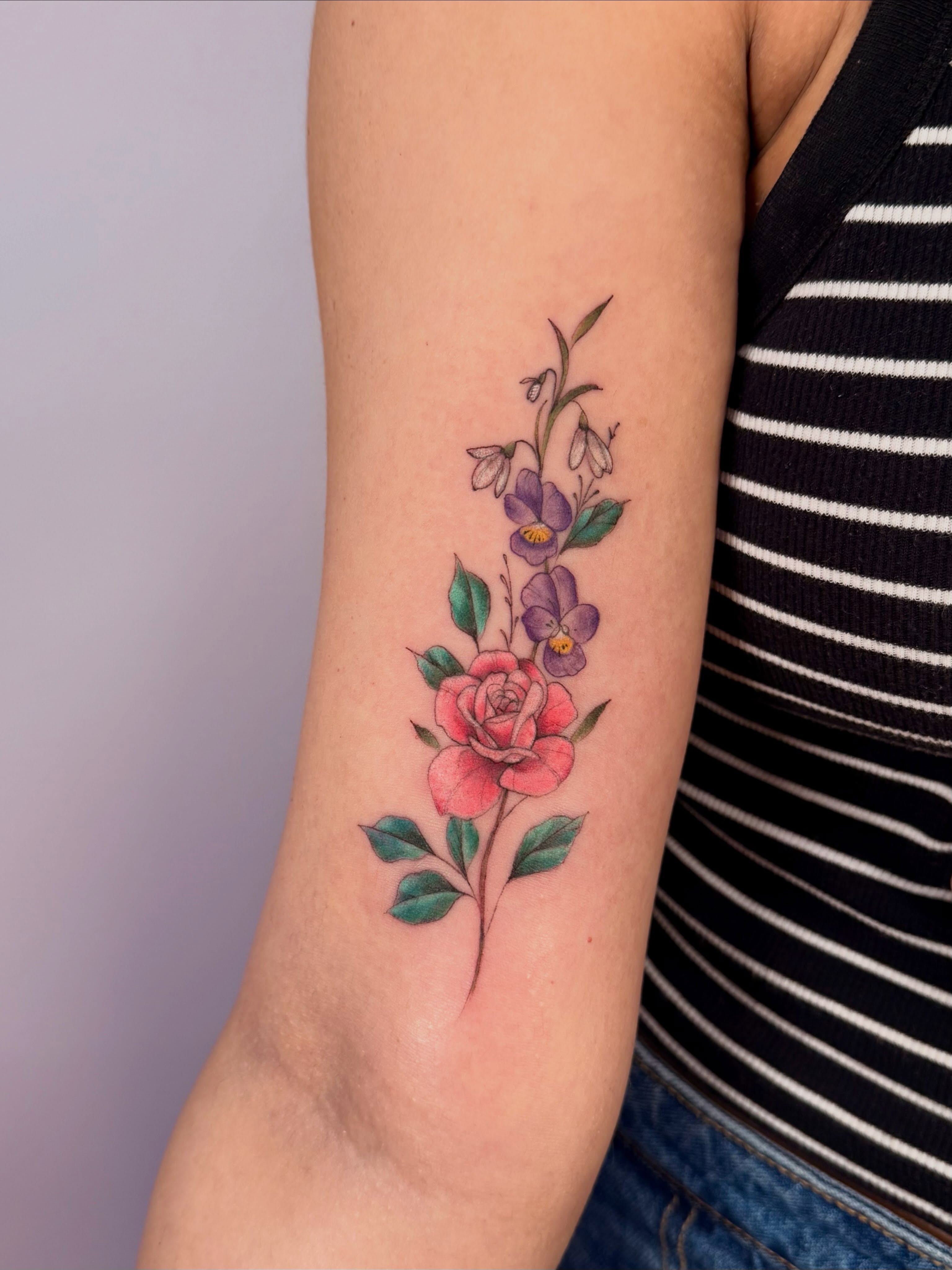 Floral arrangement realism tattoo on the forearm by Marianna D D King