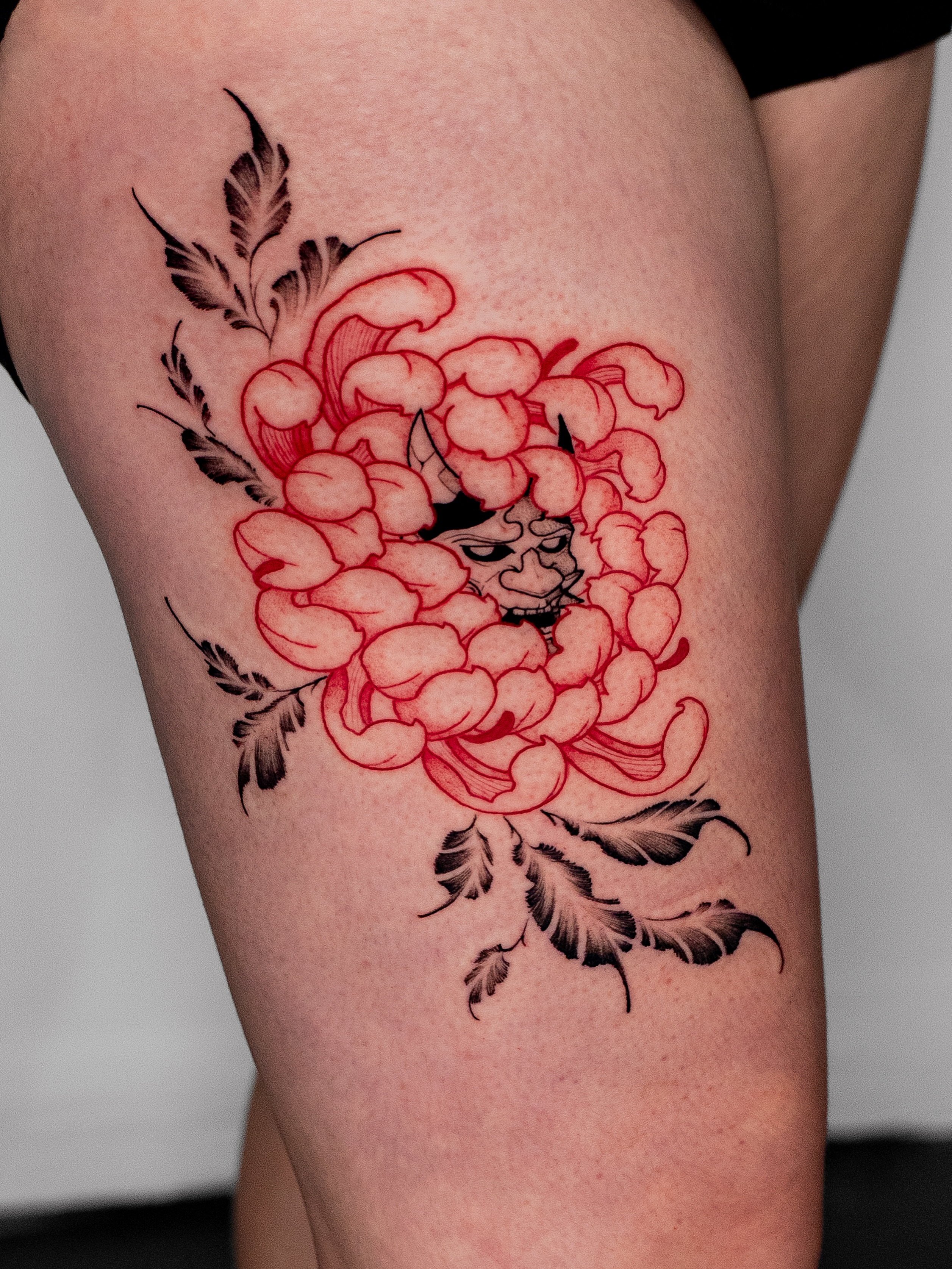 Peony American traditional tattoo on the thigh by Kalin, Seattle, Washington