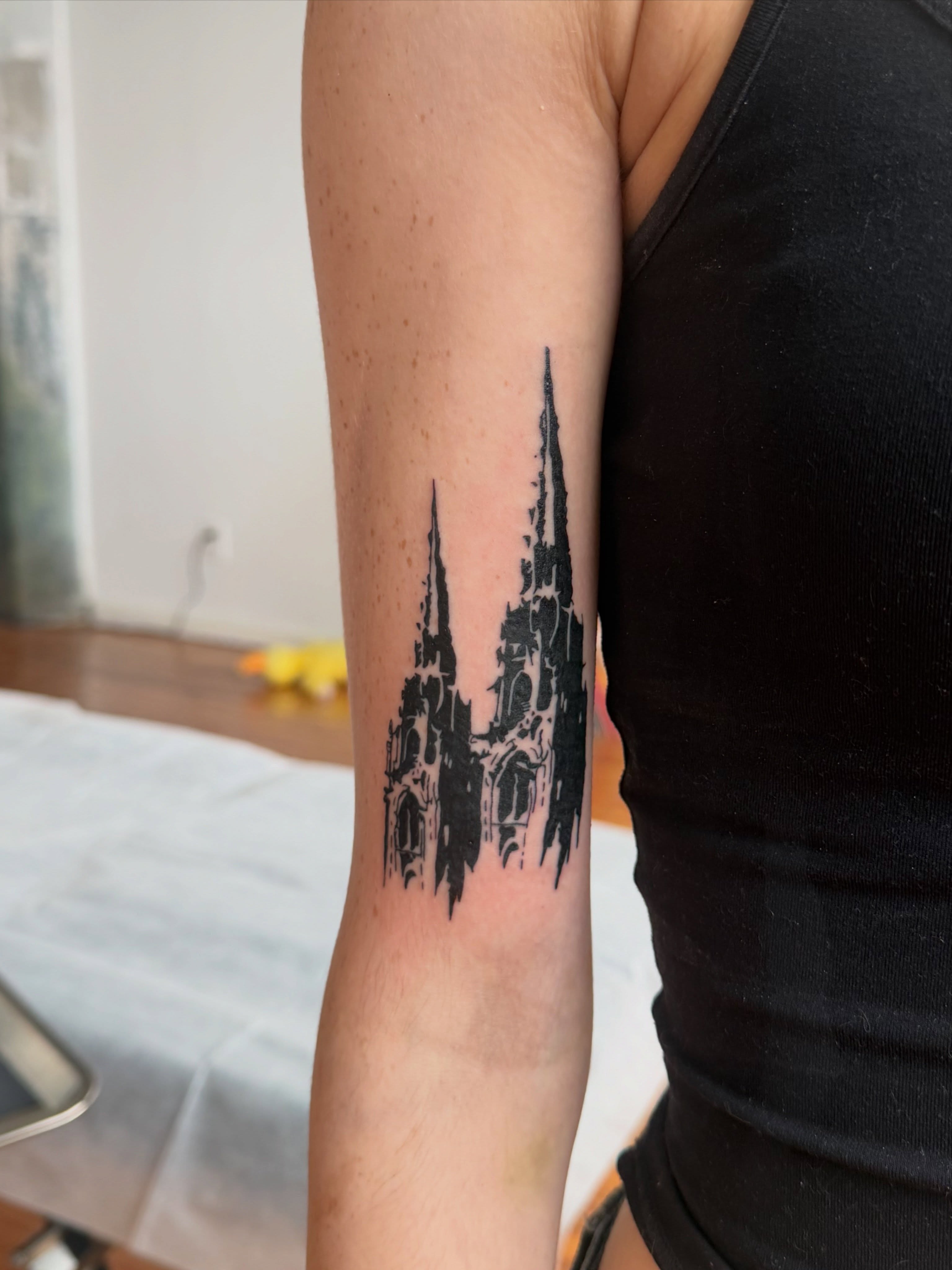 Gothic cathedral black and grey tattoo on the forearm by Jose Javier