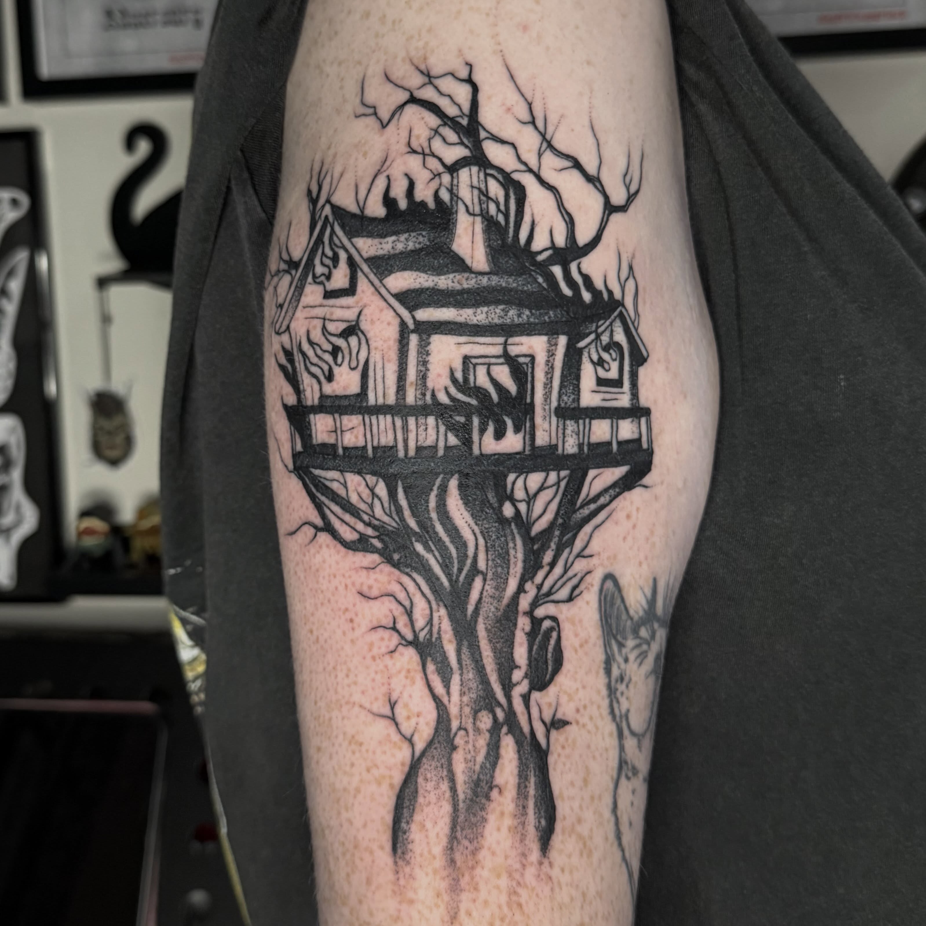 Haunted house dark realism tattoo on the forearm by Aiden Shaw