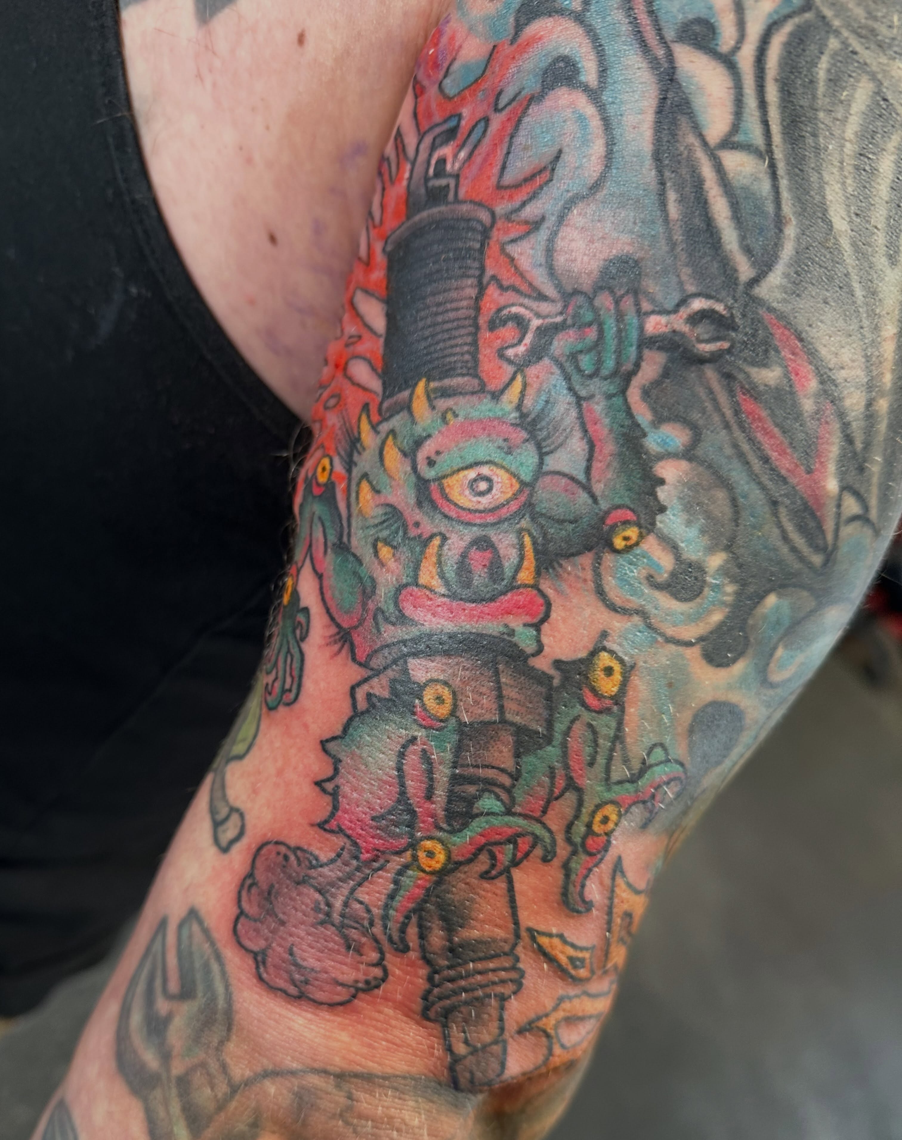 Monster American traditional tattoo on the forearm by Joey Knuckles