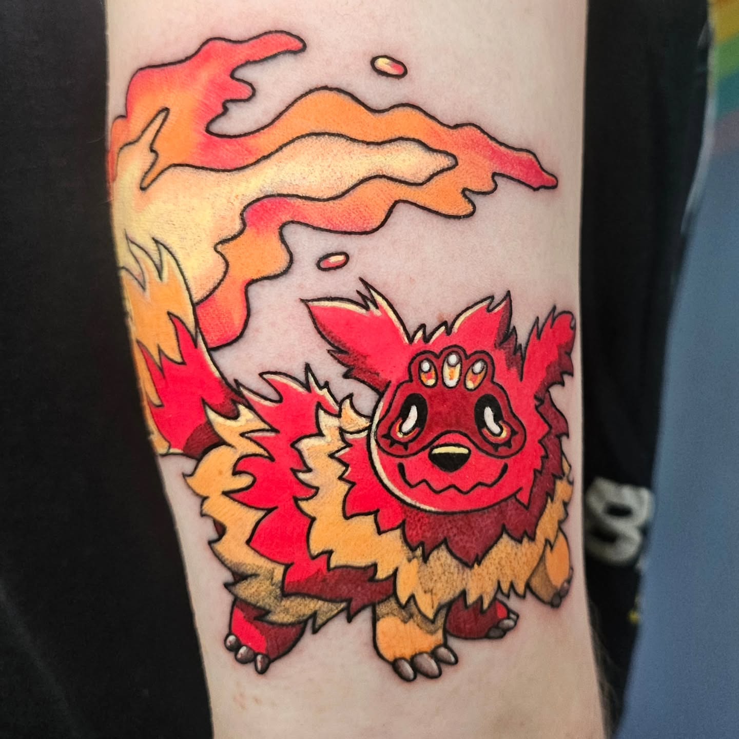 Flame creature new school tattoo on the forearm by Gray