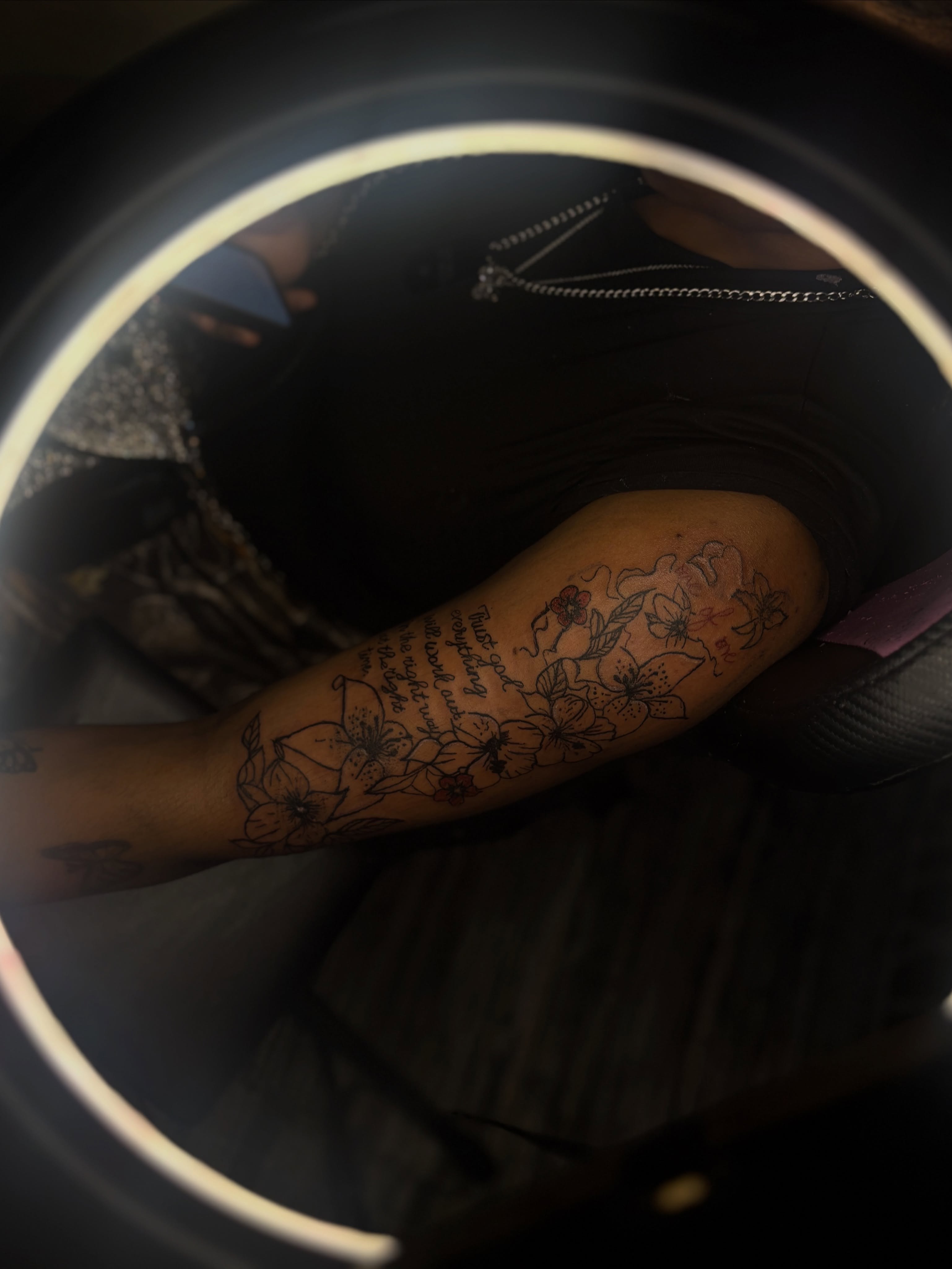 Floral design black and grey tattoo on the forearm by Winter j