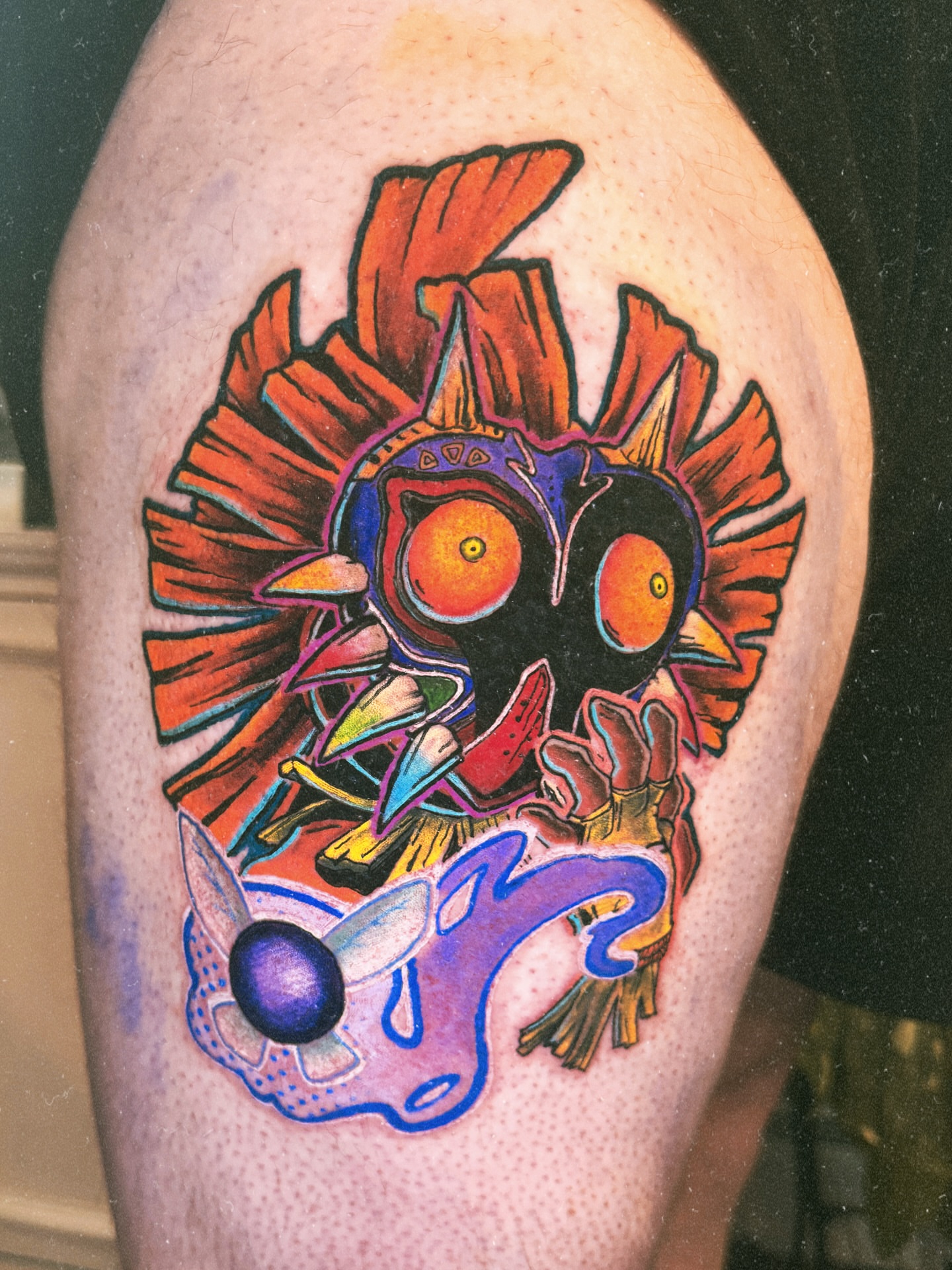 Majora's Mask new school tattoo on the thigh by Eric Burns - NoVA Tattoo Artist