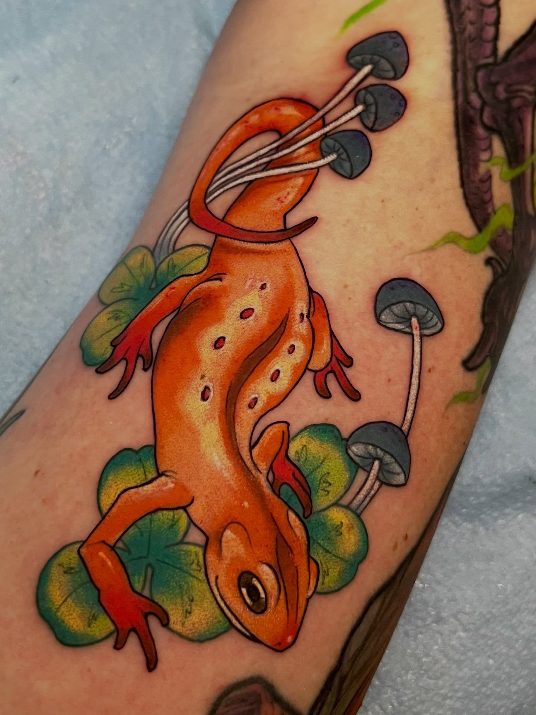 Axolotl new school tattoo on the forearm by Cassandra