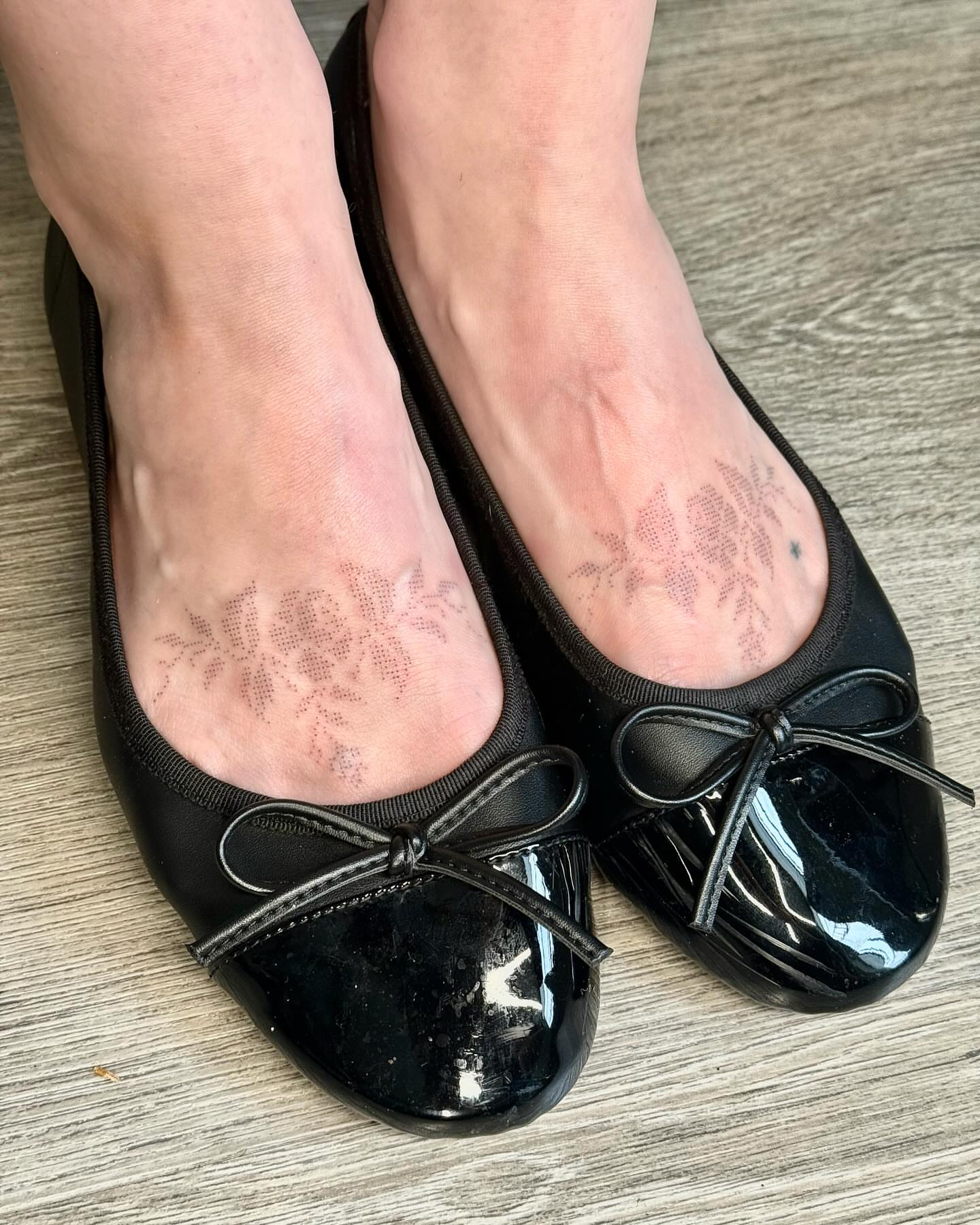 Floral pattern black and grey tattoo on the foot by GG ๐ธ