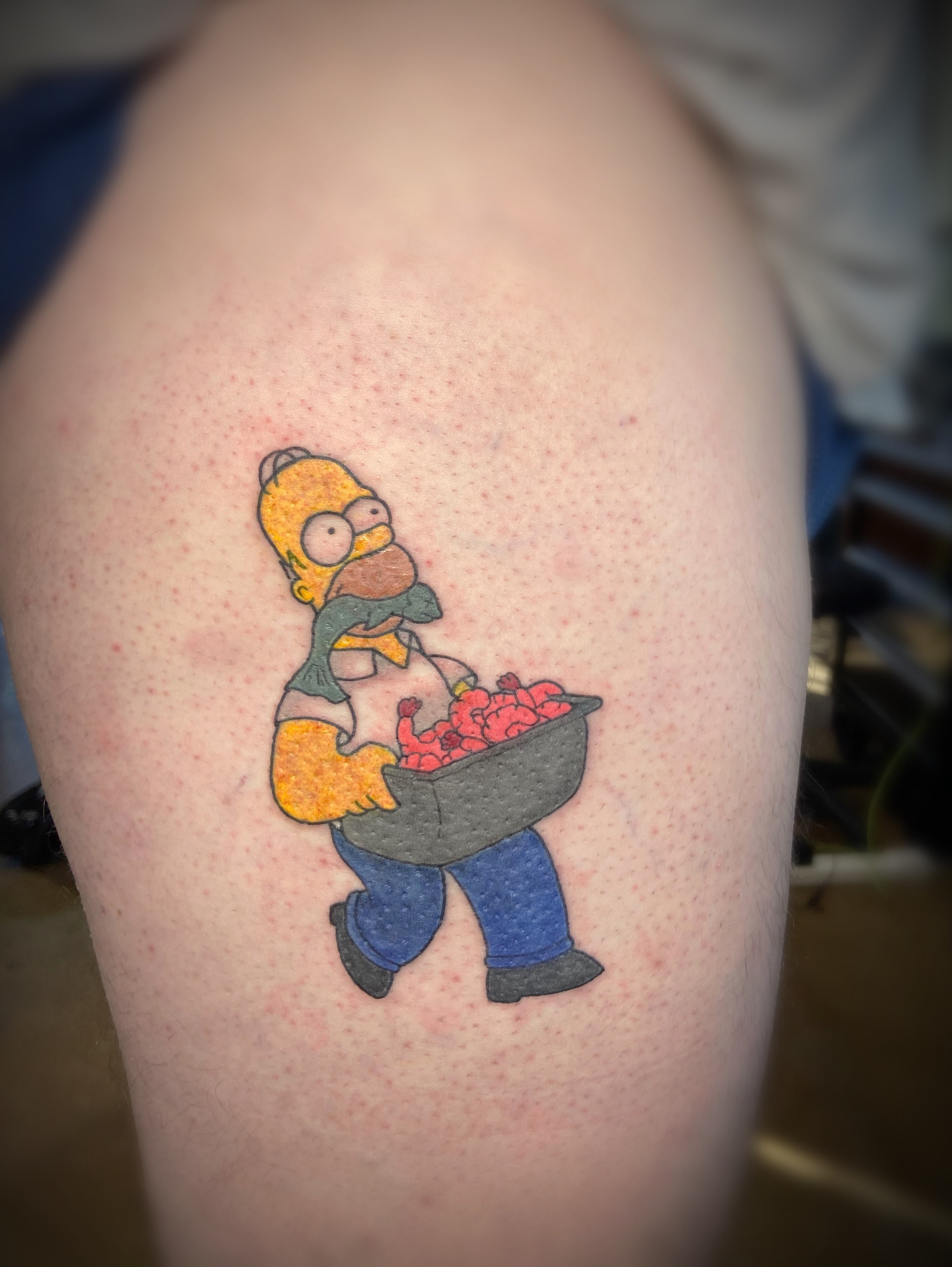 Homer Simpson dotwork tattoo on the thigh by San Diego Tattoo Artist