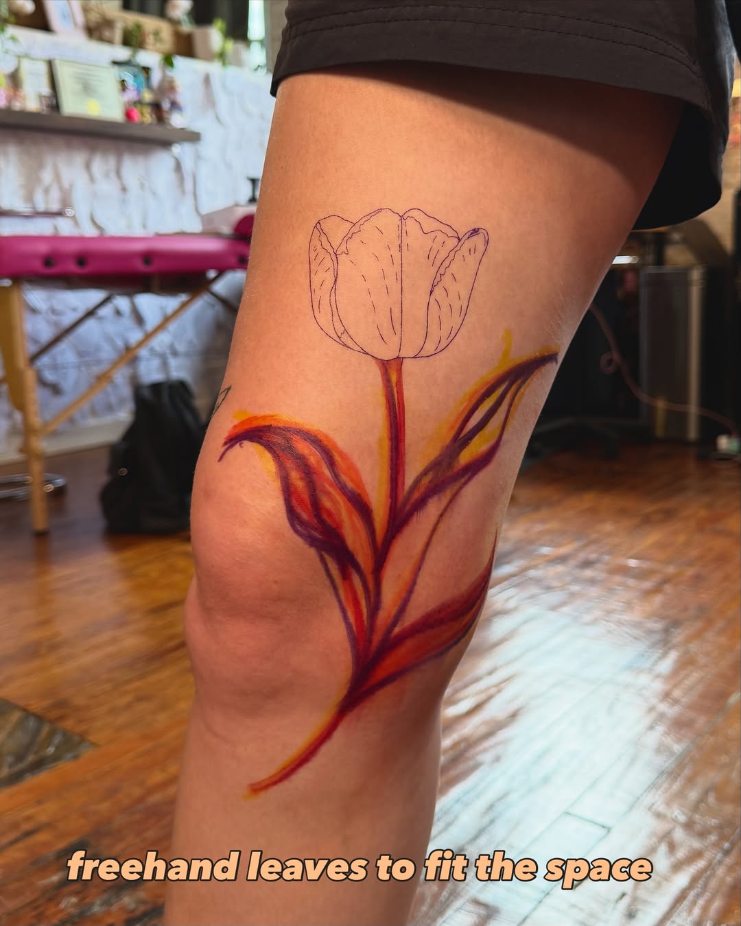 Tulip new school tattoo on the thigh by laura baldwin