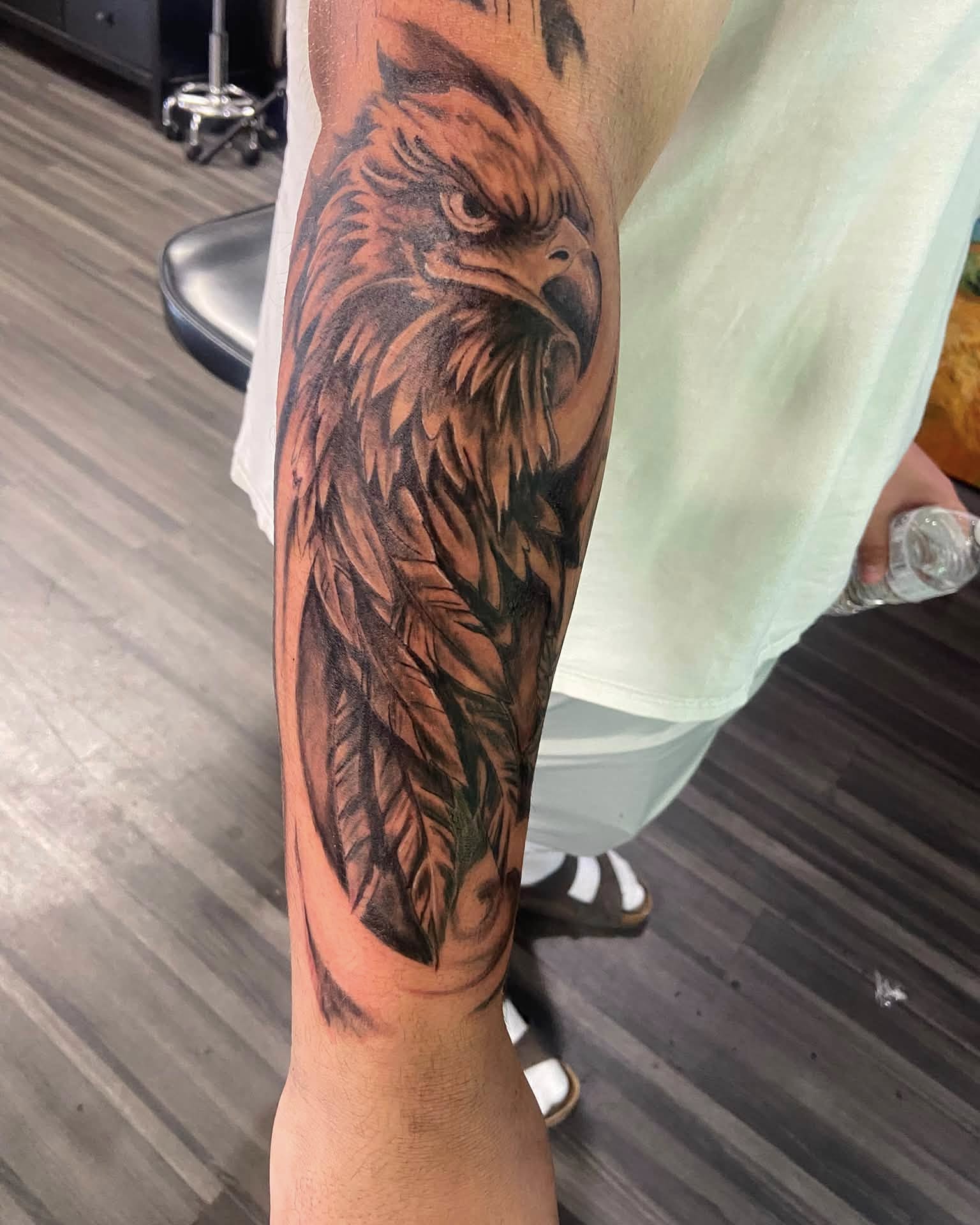 Eagle realism tattoo on the forearm by Mike Berry