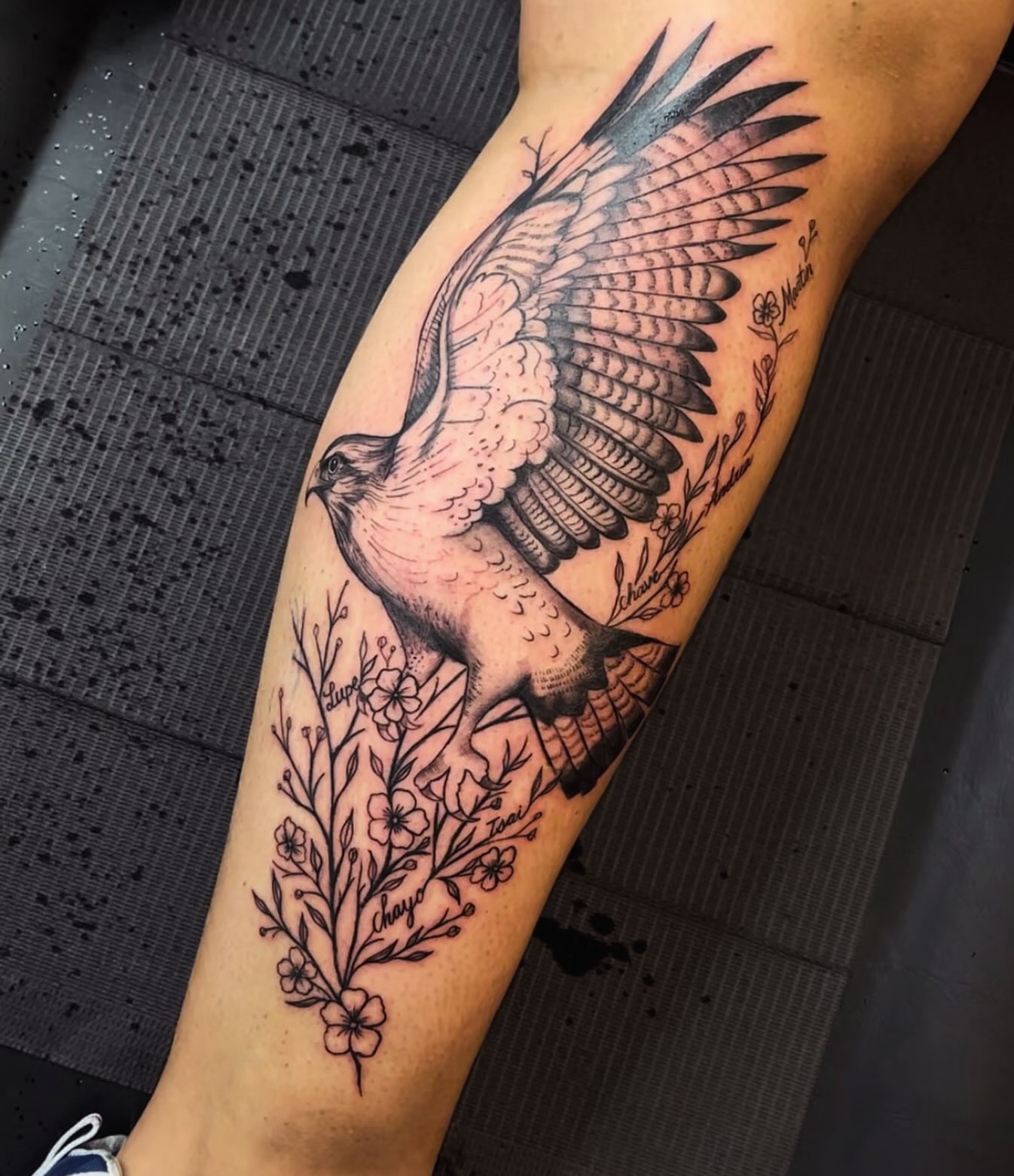 Hawk black and grey tattoo on the forearm by Tattoomobile