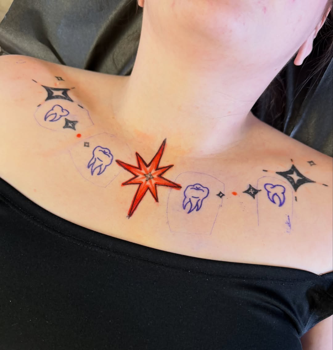 Geometric star and teeth geometric tattoo on the shoulder by Kane L, Albuquerque, New Mexico