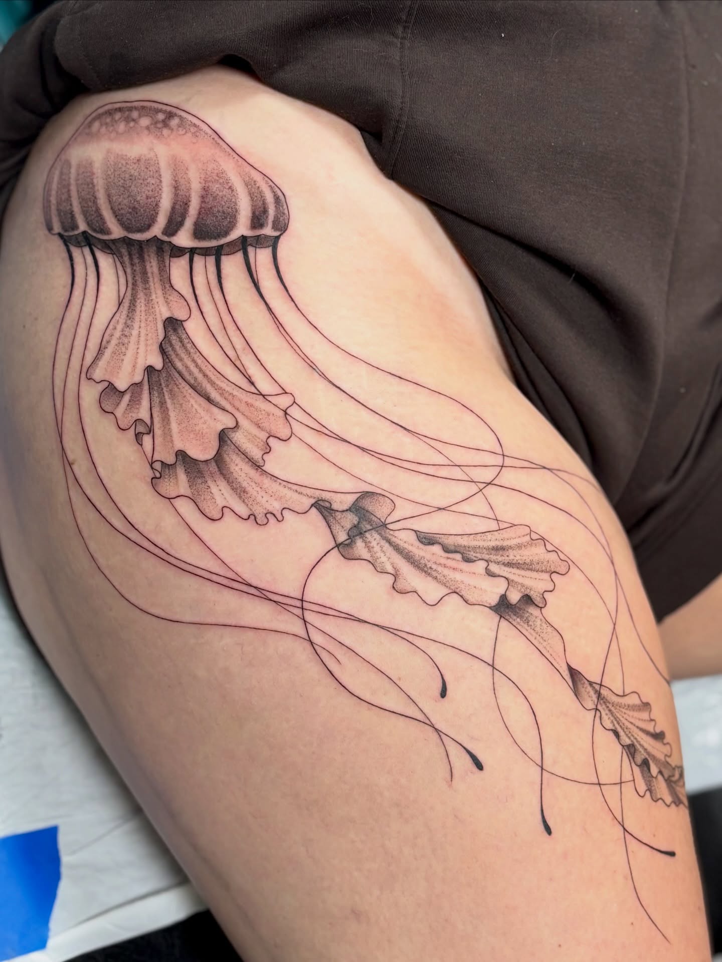 Jellyfish realism tattoo on the shoulder by sydney honn