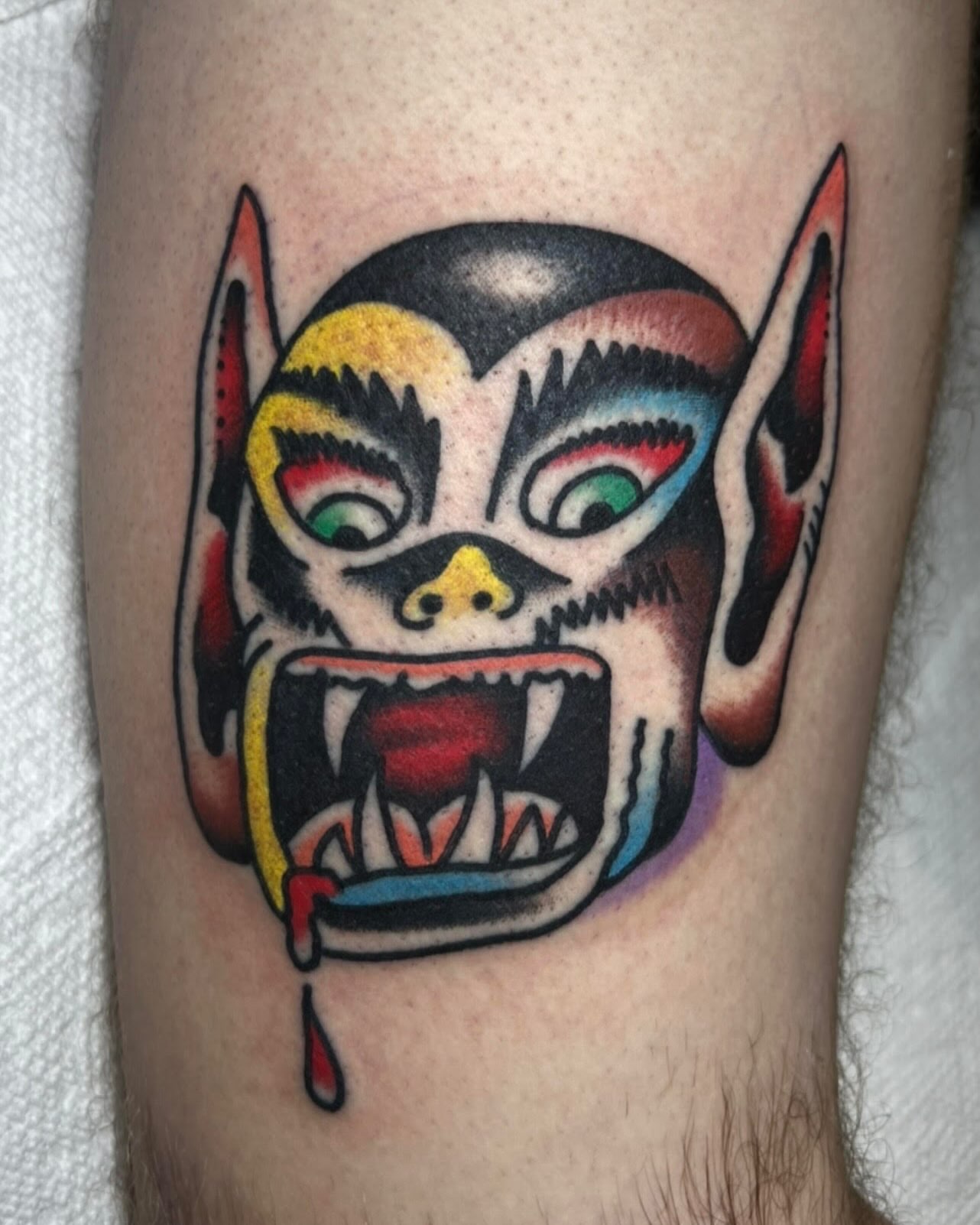Demon face American traditional tattoo on the forearm by Tattoo