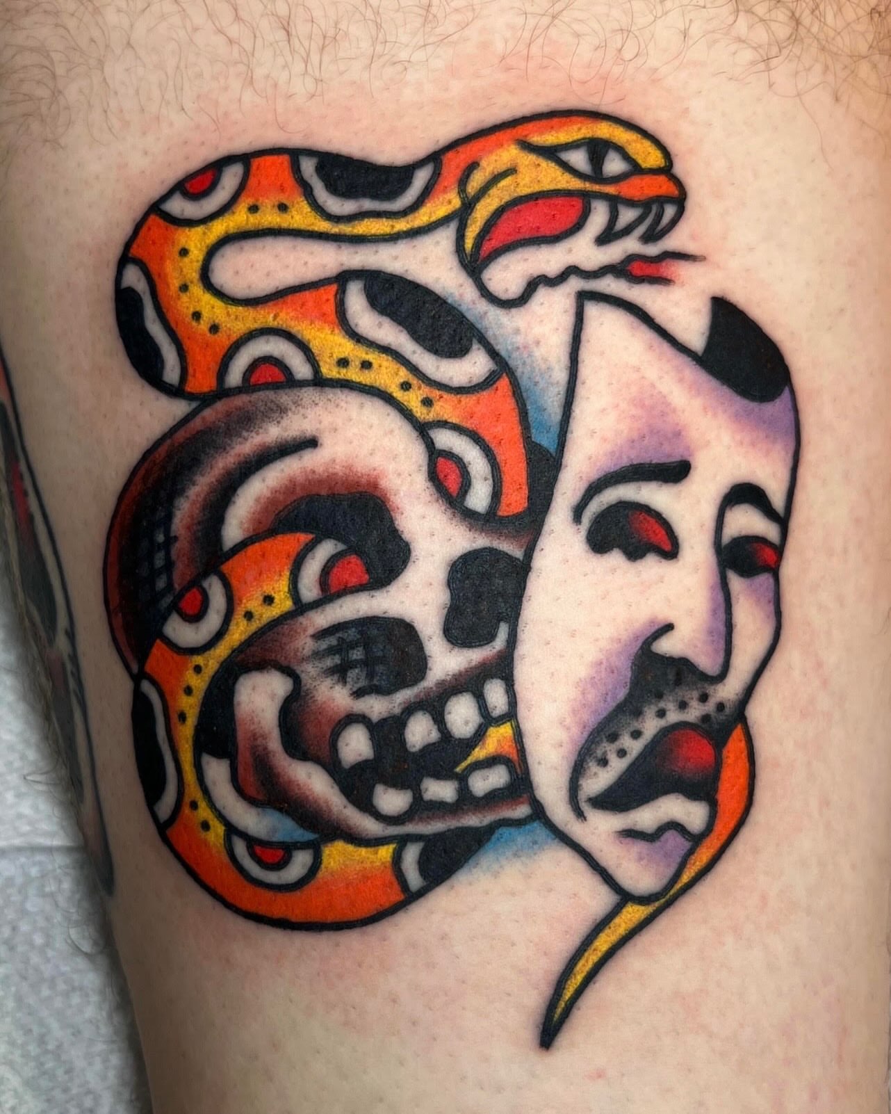 Snake and skull American traditional tattoo on the thigh by Tattoo