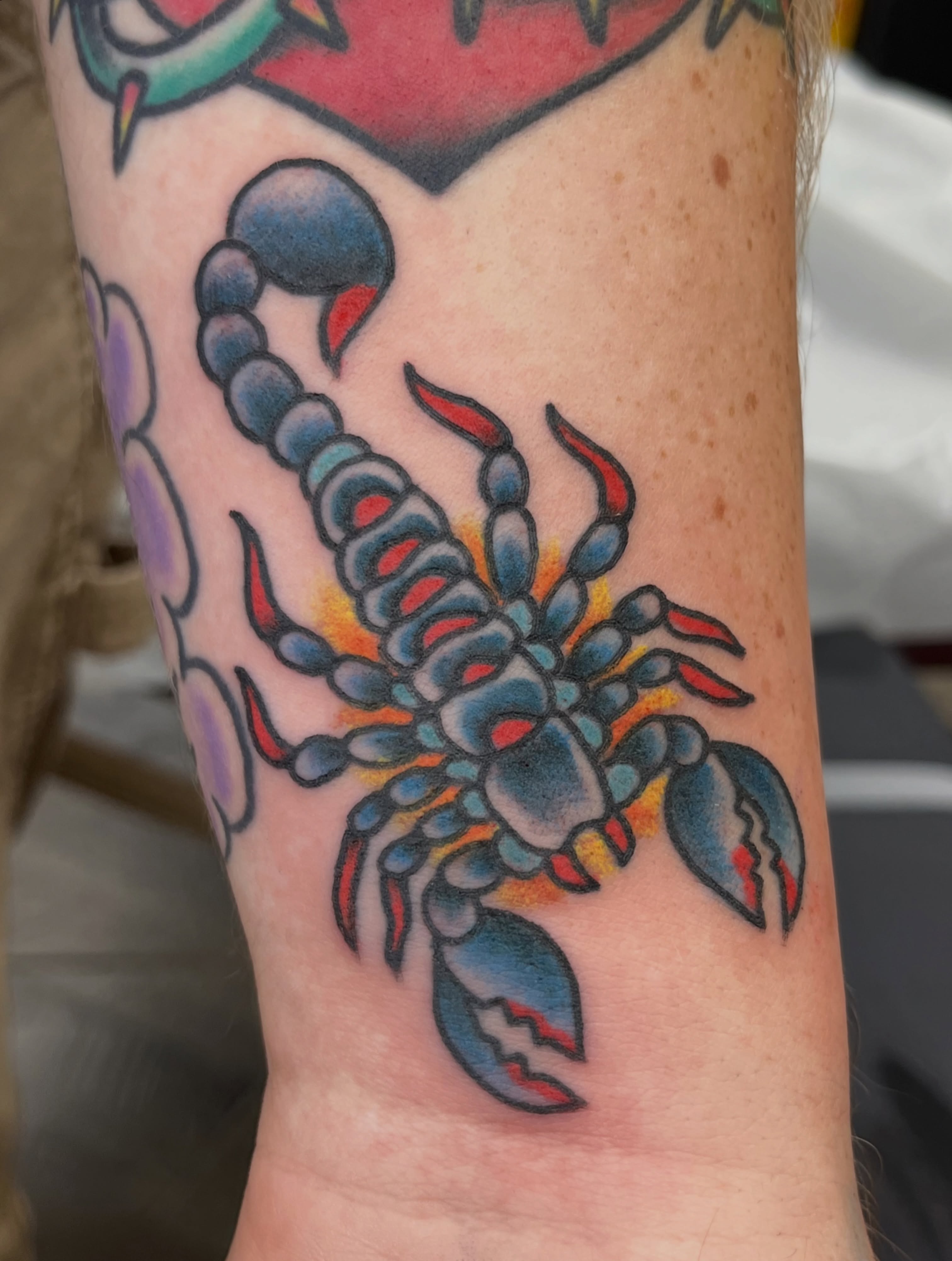 Scorpion American traditional tattoo on the forearm by Steve Tiberi